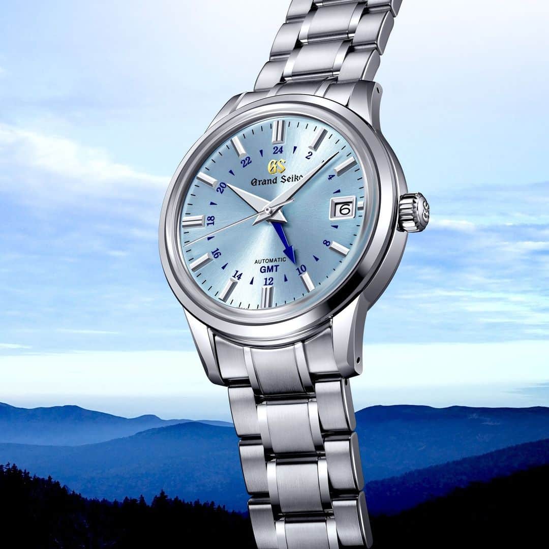 Grand Seikoのインスタグラム：「【Elegance Collection Caliber 9S 25th Anniversary Limited Edition #SBGM253 】  Its design depicts the clear blue sky as seen from the top of Mt. Iwate, the soaring peak visible through the windows of the Grand Seiko Studio Shizukuishi.  The timeless watches has a classic profile, yet a see-through case back provides a view of the thoroughly modern 9S66 GMT movement, which has been outfitted with a special titanium oscillating weight that has been colored Grand Seiko Blue through an anodic oxidation treatment.  #grandseiko #thenatureoftime #aliveintime」