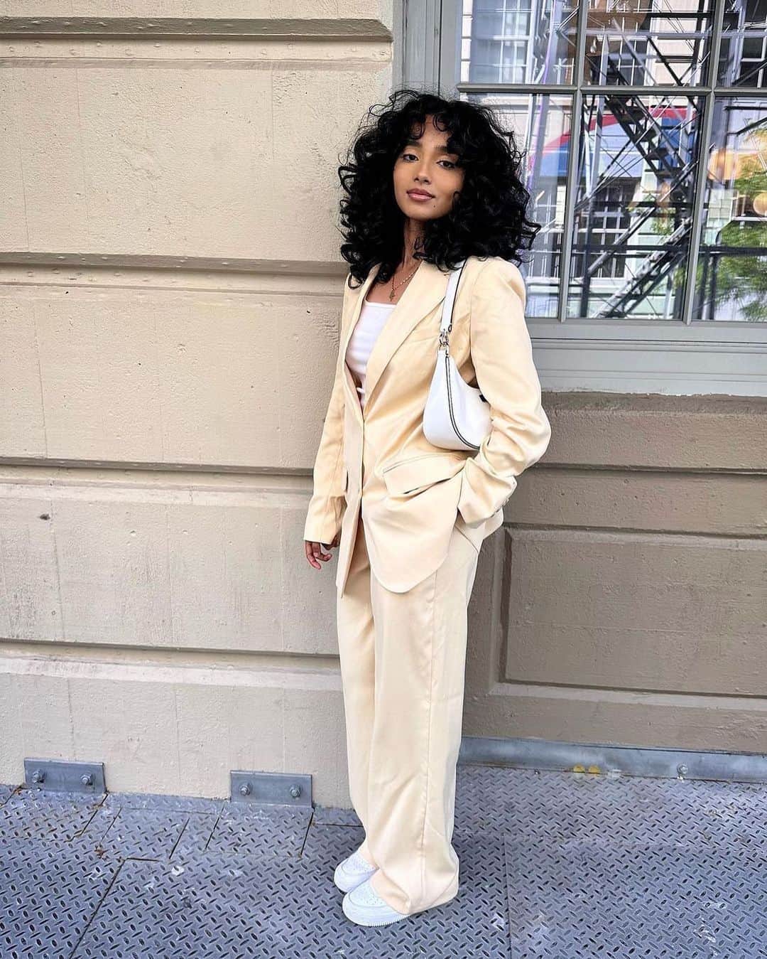 のインスタグラム：「Suit up.  @tiger_curls wears a straight fitted blazer [123459762] with slouch trousers [123459770]」