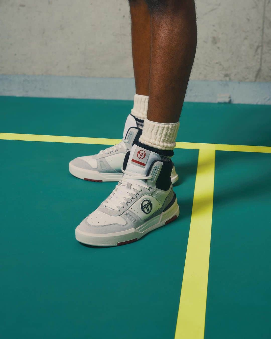 セルジオタッキーニのインスタグラム：「A contemporary spin on 80s basketball designs, the BB Court Hi Sneaker features bold color pops over a hi-top silhouette for a retro vibe. Photographed by @adamtitchener and styled by @jordandeanschneider.」