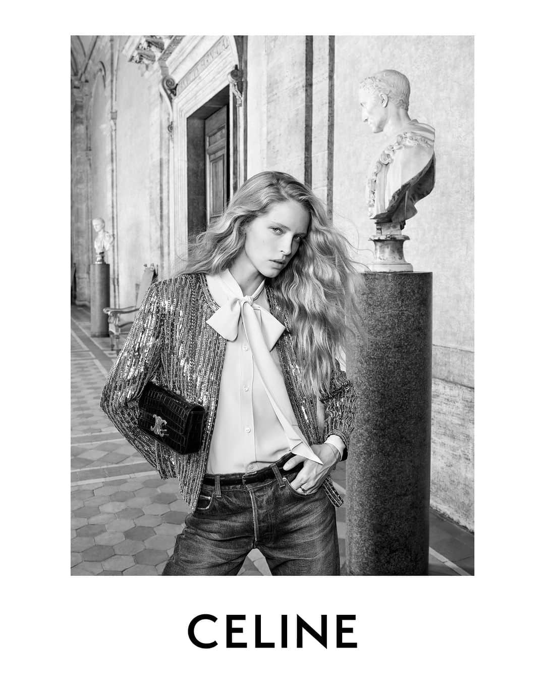Celineのインスタグラム：「LA COLLECTION DES GRANDS CLASSIQUES 07  CELINE CHAIN SHOULDER CLAUDE BAG  CELINE EMBROIDERED CHASSEUR JACKET  CELINE SILK LAVALLIERE BLOUSE  COLLECTION AVAILABLE NOW IN STORES AND ON CELINE.COM  ABBY @HEDISLIMANE PHOTOGRAPHY AND STYLING ROME SEPTEMBER 2023  PALAZZO FARNESE   CELINE’S LATEST WOMEN’S CAMPAIGN FOR LA COLLECTION DES GRANDS CLASSIQUES HAS BEEN PHOTOGRAPHED BY HEDI SLIMANE IN ROME IN SEPTEMBER 2023 AT PALAZZO FARNESE.  FOR THE FIRST TIME EVER, A COUTURE HOUSE HAS GAINED ACCESS TO THE PALACE.  PALAZZO FARNESE, A RENOWNED ROMAN PALACE, DESIGNED BY ANTONIO DA SANGALLO IL GIOVANE, BUILT IN THE 16TH CENTURY AND COMPLETED BY MICHELANGELO, IS AN EXAMPLE OF HIGH RENAISSANCE ARCHITECTURE.  HOME TO NUMEROUS MASTERPIECES COMBINING PAINTINGS, SCULPTURES AND ARCHITECTURE; GALLERIES ARE DECORATED WITH FRESCOS INCLUDING THE MONUMENTAL FRESCO CYCLE BY ANNIBALE CARRACCI, WALLS ARE EMBELLISHED WITH TAPESTRIES AMONGST DECORATED SARCOPHAGUSES AND ROMAN SCULPTURES.   THE PALACE HAS BEEN THE FRENCH EMBASSY’S RESIDENCE IN ITALY SINCE 1874.  #CELINEBYHEDISLIMANE」