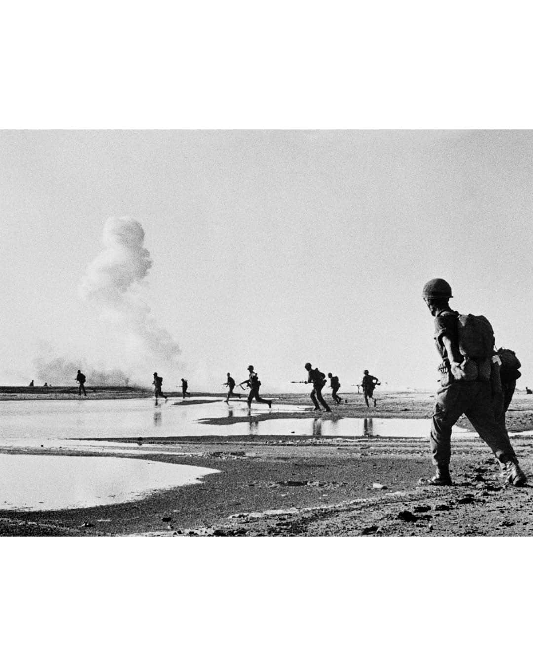 Magnum Photosさんのインスタグラム写真 - (Magnum PhotosInstagram)「Hamas launched a large-scale attack against Israel from the Gaza Strip on Saturday, October 7, a day after the 50th anniversary of the start of the Yom Kippur War, also known as the 1973 Arab-Israeli War.⁠ ⁠ On October 6, 1973, Egypt and Syria launched a surprise attack on Israeli positions in the Sinai Peninsula and Golan Heights. Magnum photographers @michabaram.archive, @leonardfreed, @abbas.photos and Bruno Barbey closely documented the ensuing 19-day armed conflict between Israel and a coalition of Arab states led by Egypt and Syria.⁠ ⁠ Hamas began this weekend’s attack with a barrage of rockets while militants crossed the border into Israel, killing and taking civilians and soldiers hostage. Israel has since formally declared war, responding with heavy airstrikes and cutting off electricity in Gaza. Both sides have suffered hundreds of casualties.⁠ ⁠ PHOTOS (left to right): ⁠ ⁠ (1) Israel Army in Sinai Desert. Israel. 1973.© @leonardfreed / Magnum Photos⁠ ⁠ (2) Egyptian troops crossing the Suez canal during the war with Israel.  Fardan. Egypt. 1973. © @abbas.photos / Magnum Photos⁠ ⁠ (3) The body of a dead Palestinian from the Saika Corps of the Syrian Army Brigade. Israel/Syria. October 13, 1973. © @abbas.photos / Magnum Photos⁠ ⁠ (4) Israeli forces advancing with rocket fire toward the Suez Canal. 1973. © @michabaram.archive / Magnum Photos⁠ ⁠ (5) 34 Israeli soldiers taken prisoner by Syrians are carried away on trucks. Their hands are bound and they are blindfolded to be presented to the international press. October 15, 1973. © Bruno Barbey / Magnum Photos⁠ ⁠ (6) Israeli units making their way to Damascus (Syria) stop with their tanks and guns for traditional prayers. October 16, 1973. © @leonardfreed / Magnum Photos⁠ ⁠ (7) Israeli forces on their way to the "Budapest" stronghold, a code name for the northernmost stronghold on the Bar Lev line. North Sinai. October 1973. © @michabaram.archive / Magnum Photos⁠ ⁠ (8) Israeli Defense Minister Moshe Dayan. Israel/Syria. October 11, 1973. © @abbas.photos / Magnum Photos⁠ ⁠ (9) Silhouettes of Israeli soldiers during fighting in the desert. Sinai October 1973. © @michabaram.archive / Magnum Photos」10月9日 21時00分 - magnumphotos