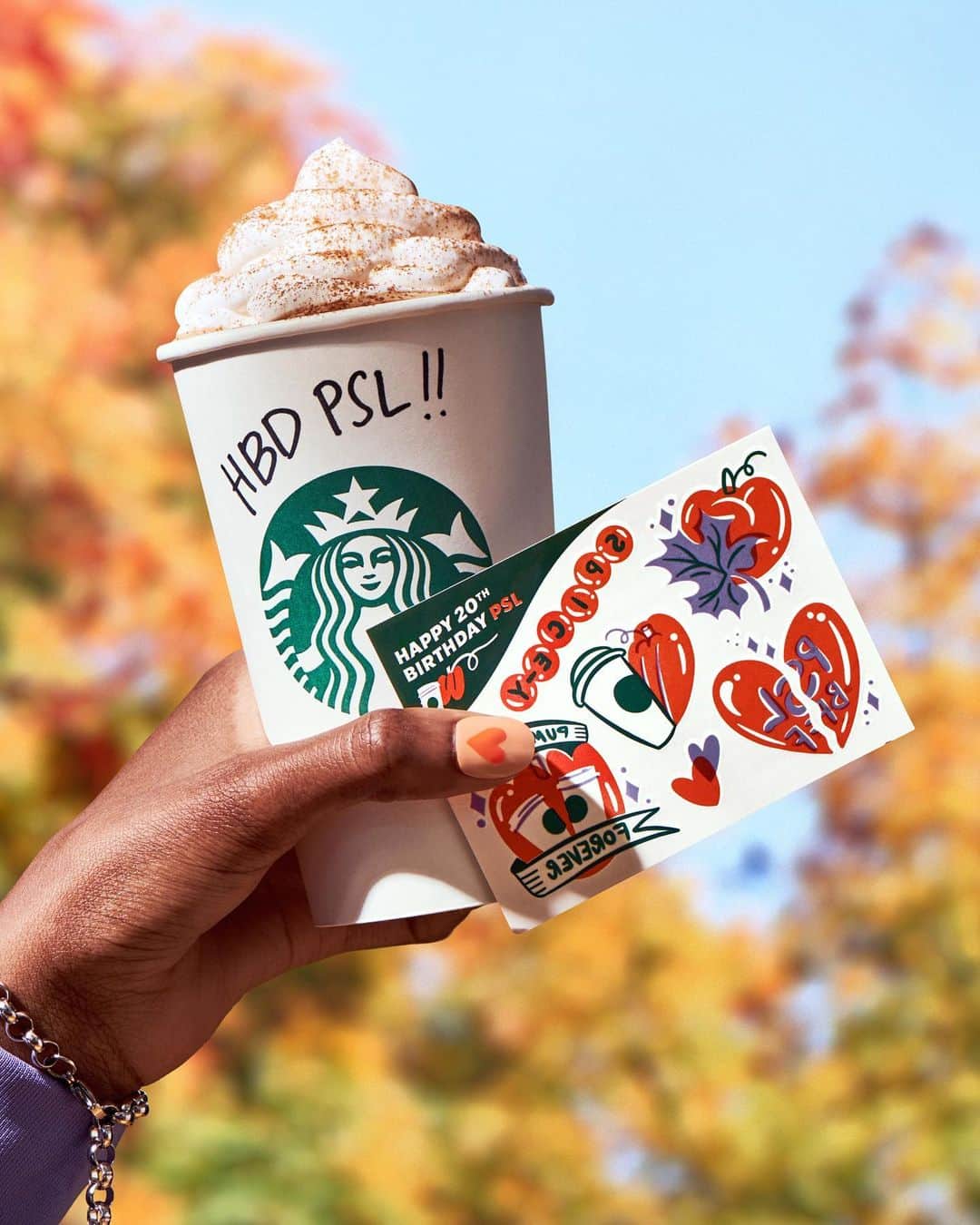 Starbucksのインスタグラム：「Twenty years ago, our PSL brought fall to all. 🧡 Celebrate with us tomorrow, 10/10, and get a free sheet of our temporary tattoos full of pumpkin love with any purchase of a Pumpkin Spice Latte (hot, iced, blended). At participating stores in U.S. and Canada, while supplies last.」