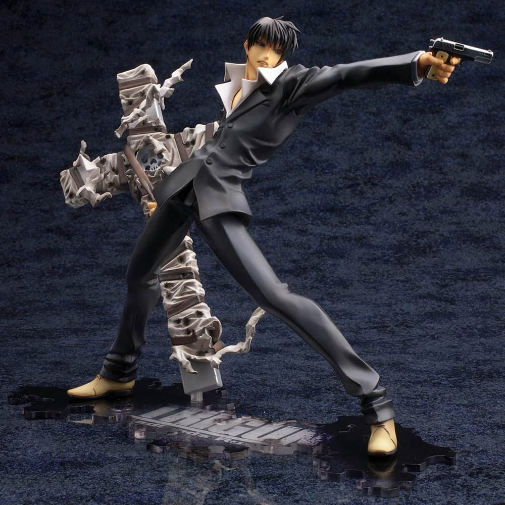 株式会社 壽屋 コトブキヤのインスタグラム：「From Trigun: Badlands Rumble, the wandering priest with his Kansai dialect, Nicholas D. Wolfwood, makes a comeback to the ARTFX J series in a renewal package version!  He comes to life gripping his gun in one hand and Punisher in the other in a dynamic stance. At his feet, the silver series logo appears in a striking clear base riddled with bullet holes.  From the posing decisions all the way down to the base, every detail of this design was proposed by Yasuhiro Nightow himself. Countless reviews and strict revisions were imposed to perfect various features, from his expression and lines of his body, to the sculpt and painting of his suit, creating this truly definitive 1/8 scale figure.  His sunglasses can also be removed.  A chibi-style, mini figure of Nightow is also included as a bonus.  The base can be displayed in three ways alongside the Vash the Stampede figure from the same series! Display them side by side to further enjoy the world of Trigun!  ©Yasuhiro Nightow/Shonengahosha, TRIGUN PARTNERS. Licensed by FlyingDog, Inc.  Available June 2024.」