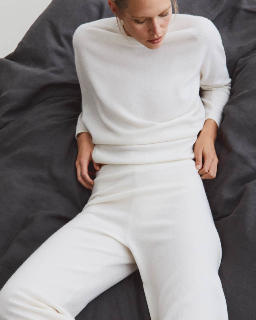 MANGOのインスタグラム：「Warm outfits and pyjamas make up the cosy dress code for the ritual of relaxing at home. Check them out at mango.com ⁣ Sweater: 57063275 ⁣ Trousers: 57023276 ⁣ Duvet cover: 57025987 ⁣ Pillowcase: 57035987 ⁣ Pyjama: 57065803 ⁣ #MangoHome」