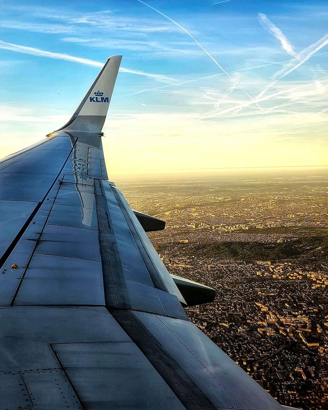 KLMオランダ航空のインスタグラム：「From up here, the world seems a little smaller, and our worries a little lighter. Take care of your mental health today and every day. 💙   📸: @maliane   #KLM #royaldutchairlines #MentalHealthAwareness #WorldMentalHealthDay」