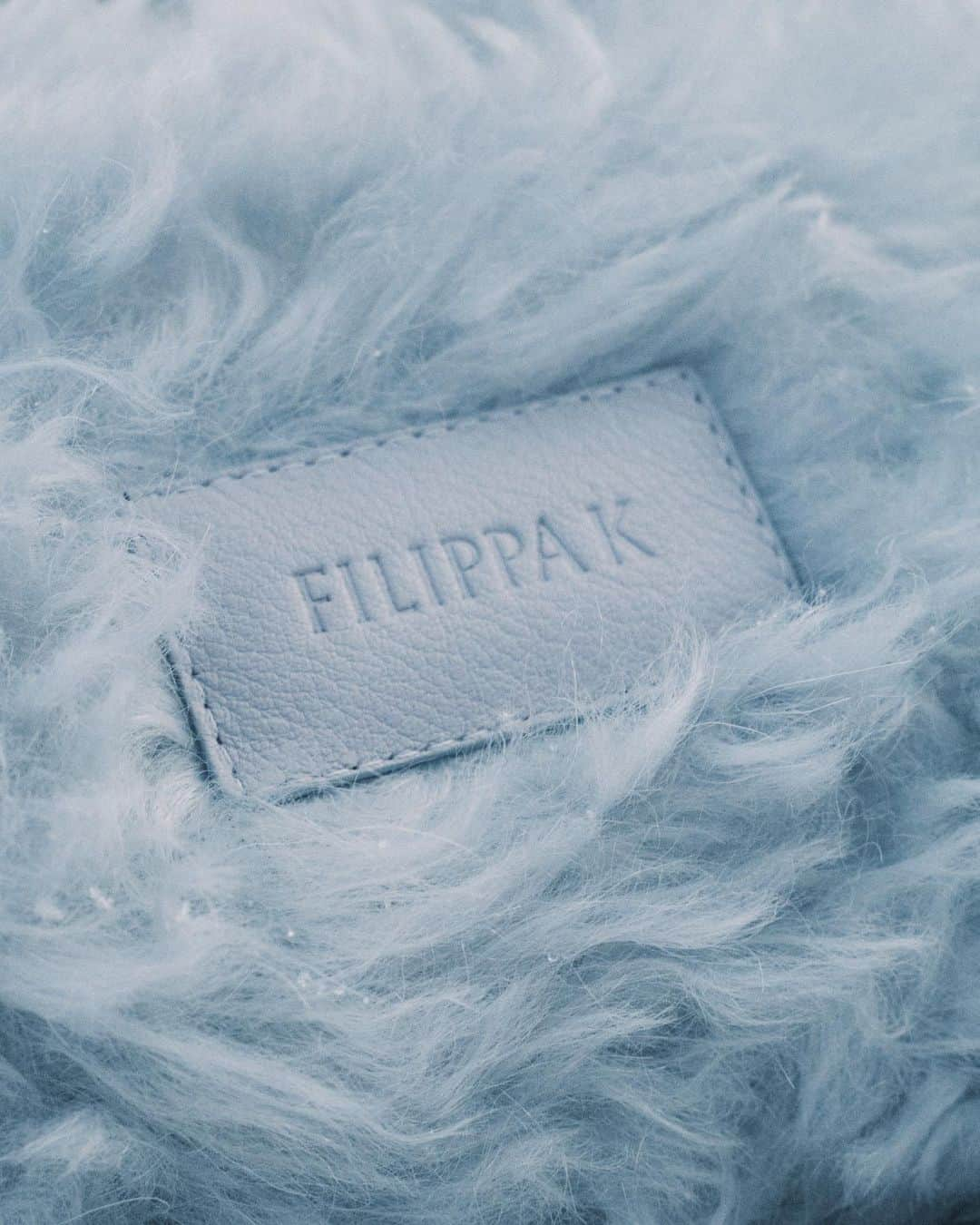 フィリッパコーのインスタグラム：「Introducing the #FilippaK AW23 Mysa Bag (Mysa means ‘to cosy up’ in Swedish). ​  The Mysa comes in two faux fur textures: an ice blue fluffy mohair, and a beige teddy-like pile in recycled polyester. Available to shop in store and at filippa-k.com ​  Photographed by @thomasjansson2 ​ Video by @jacobtovedal」