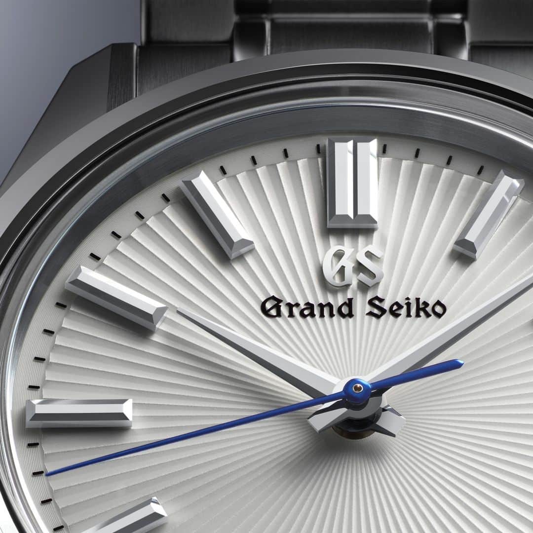 Grand Seikoさんのインスタグラム写真 - (Grand SeikoInstagram)「【New product】 #SBGW297 #SBGW299 The 44GS with a radiating dial pattern  The 44GS, the watch released in 1967 that was the first to fully embody the Grand Seiko Style, has evolved into a modern model with contemporary practicality. The SBGW297 is a manually wound mechanical model that features the smallest case diameter of the 44GS lineup at 36.5 mm.   Its radiating pattern is created from a series of flat surfaces reminiscent of a folding fan, harmonizing with the 44GS case in a design that points to the roots of the Grand Seiko Style. A vivid, thermally blued steel seconds hand marks time against the patterned white dial.  #grandseiko #thenatureoftime #aliveintime」10月11日 18時00分 - grandseikoofficial