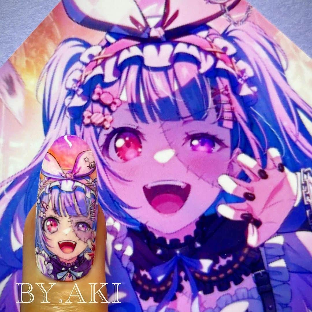 上野明子のインスタグラム：「BanG Dream!バンドリ♬ Roselia🌹宇多川あこ💜  ハロウィン🎃仕様のあこちゃん♡ ハロウィン時期が1番色々描くのが楽しいな🎵  🎨使用商材👇👇👇👇 💅プロショップ　TAT @nailshoptat  💅誰でもショップ　@nailoid.by.aki  💅直接リンク　💻プロフィールURL  #バンドリ  #bangdream  #ガルパ  #garupan  #宇多川あこ  #udagawaako  @by.aki #anime#manga#NAIL#ジェルネイル#ネイル#福岡#福岡市#全てジェルネイル#手描きネイル#all.gel#痛ネイル#ネイリスト#キャラネイル#네일#gel甲#美甲#爪甲#clou#مسمار#paku #」