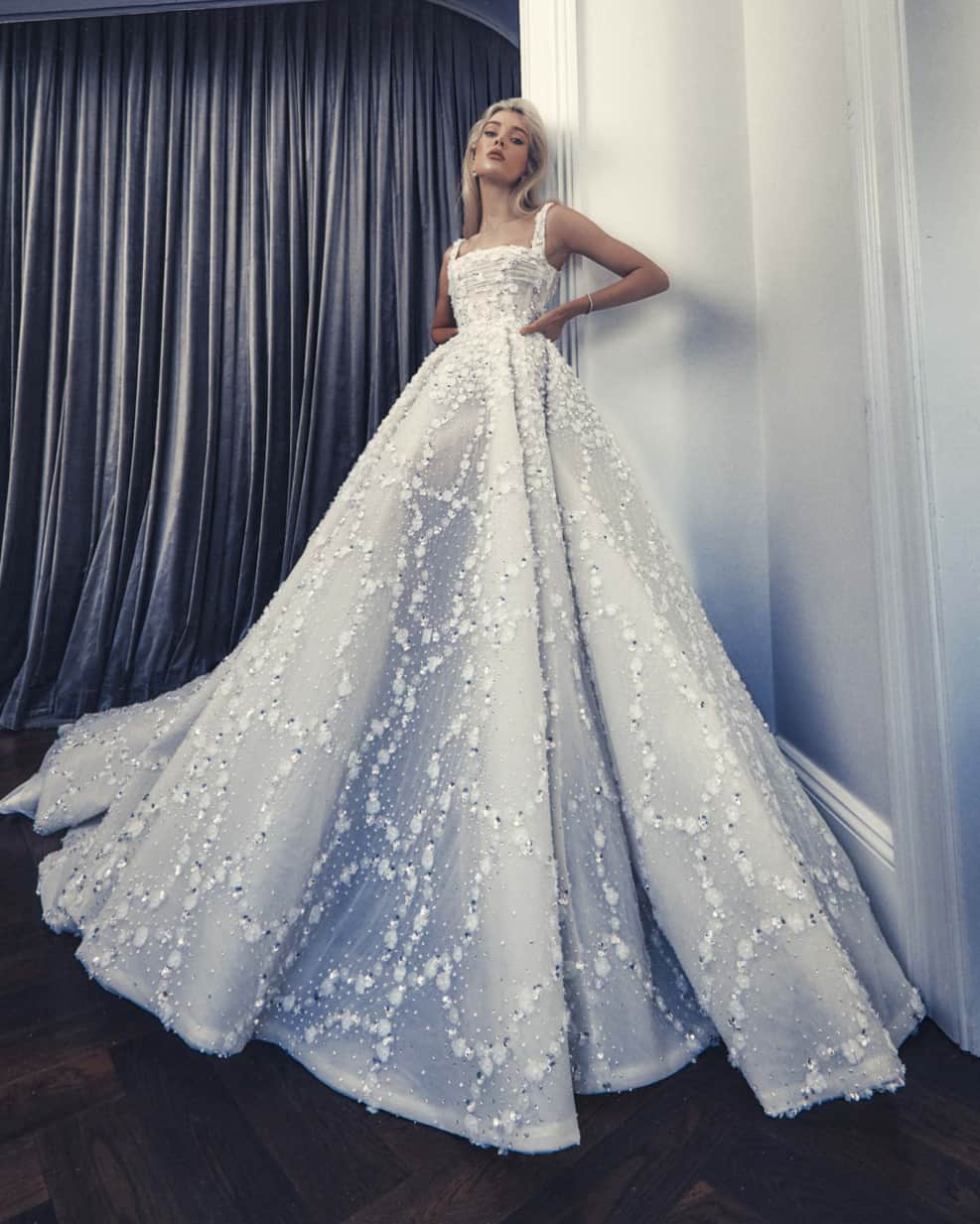 のインスタグラム：「Introducing the Jaz gown, a true work of art that embodies ethereal beauty and intricate craftsmanship. This enchanting gown features a pale latte tulle base that sets a whimsical and romantic tone.⁣Discover more by booking an appointment in our Sydney atelier. #stevenkhalil #stevenkhalilbride #weddinggown #bridal」