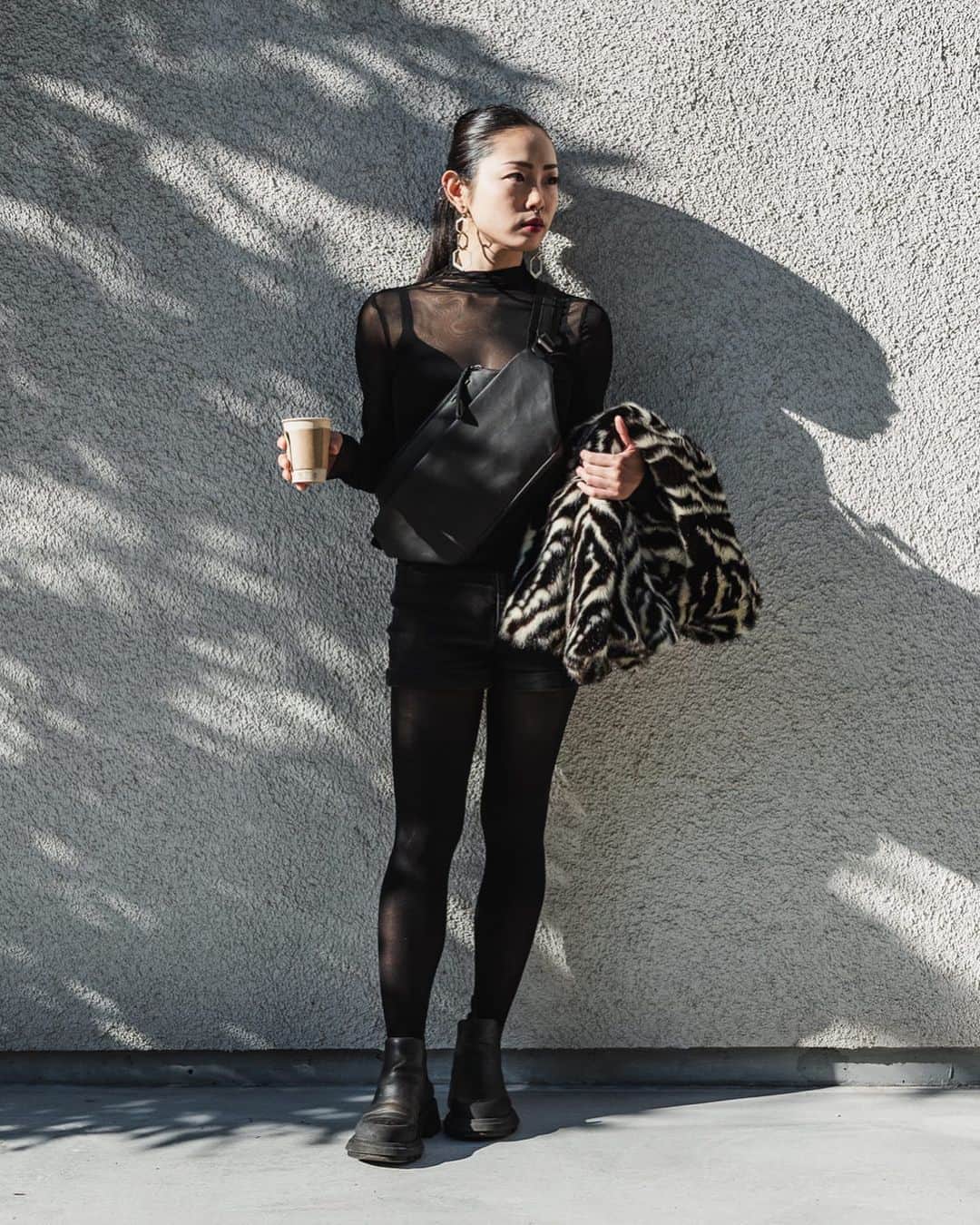 のインスタグラム：「Our friends at Sabukaru getting côte&ciel to the right people on the ground in Tokyo!   Here Kana, wears our ISARAU “Coated Canvas” which is inspired by traditional Japanese breastplate armour and is designed to be worn close to the body. Keeping your belongings close to you.   @kk_sinsoseek_ @sabukaru.online」