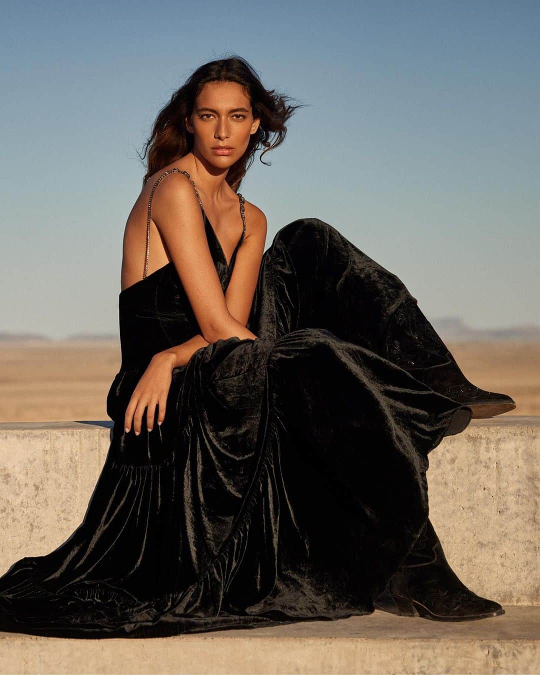 Ralph Laurenのインスタグラム：「Defined by a full-length black velvet skirt that catches the wind, #RLCollection’s Giustina dress celebrates the romance of #RalphLauren eveningwear.  Explore more from Fall 2023 via the link in bio.」
