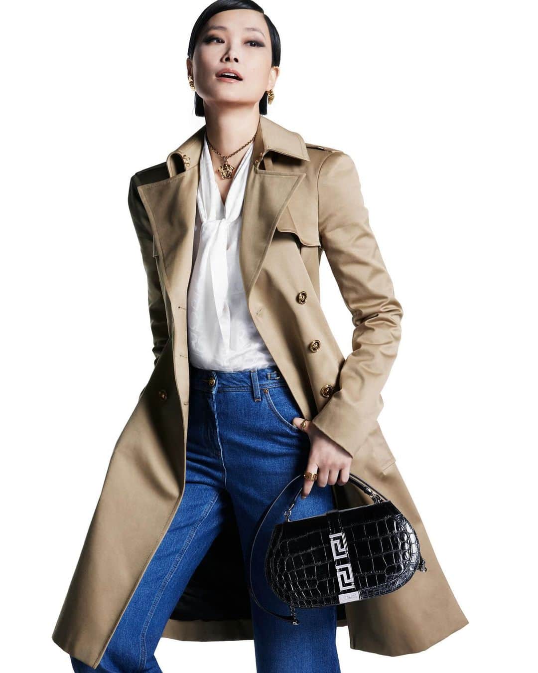 ジャンニヴェルサーチのインスタグラム：「Chris Lee for Versace Icons  Chris wears trench coat; jacquard shirt; jeans; Greca Goddess handbag  Photography by Mert & Marcus  #VersaceIcons #VersaceGrecaGoddess」