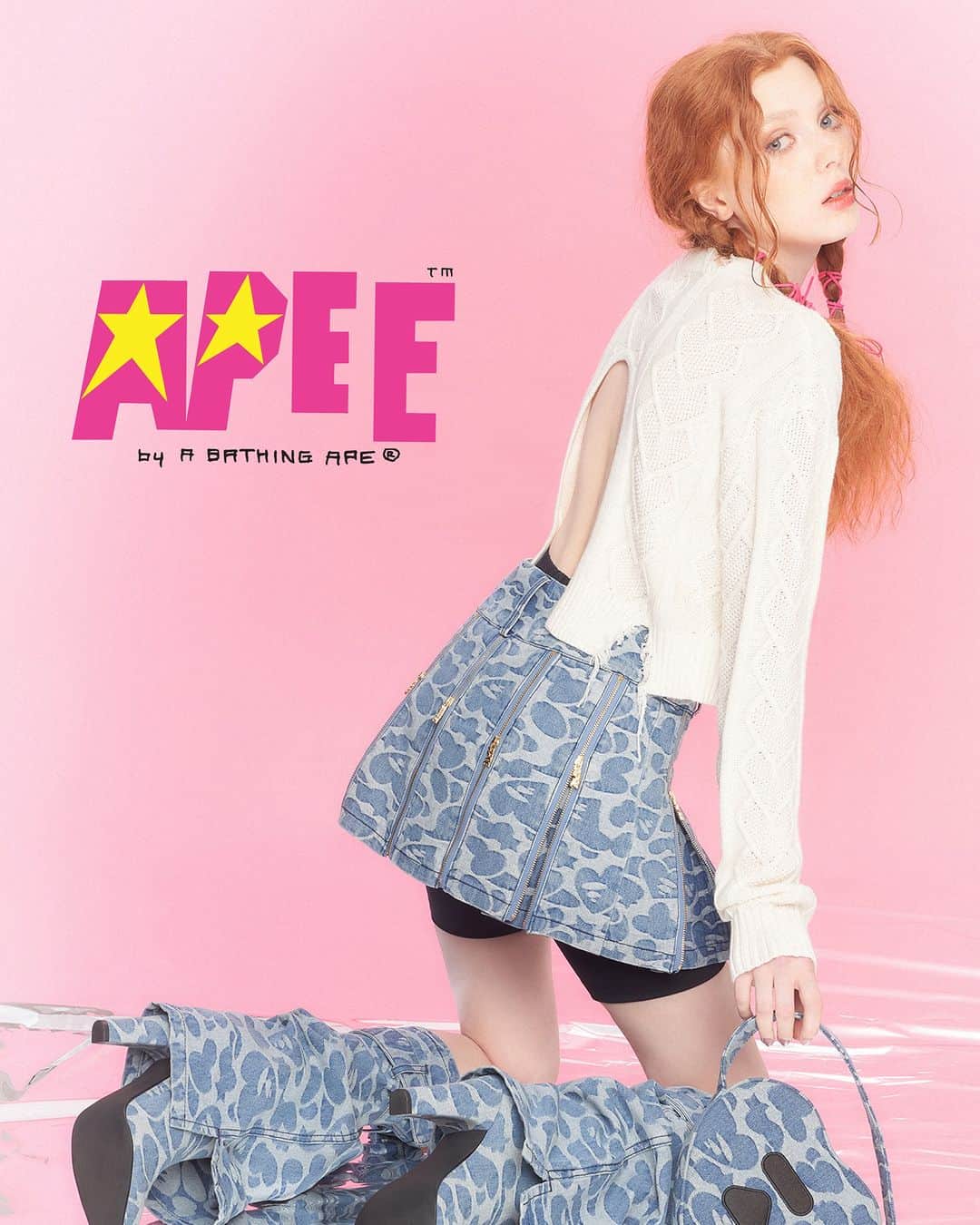 のインスタグラム：「The APEE By *A BATHING APE® 2023 Fall/Winter Collection revives the rebellious Japanese Gyaru dressing style for Z-era girls. The collection includes cropped tops, ultra-short skirts, platform boots, and leg warmers, all with a playful vintage interpretation of beloved hearts and wild camo patterns, maintaining the Y2K aesthetic.  #abathingape #bape #apee」