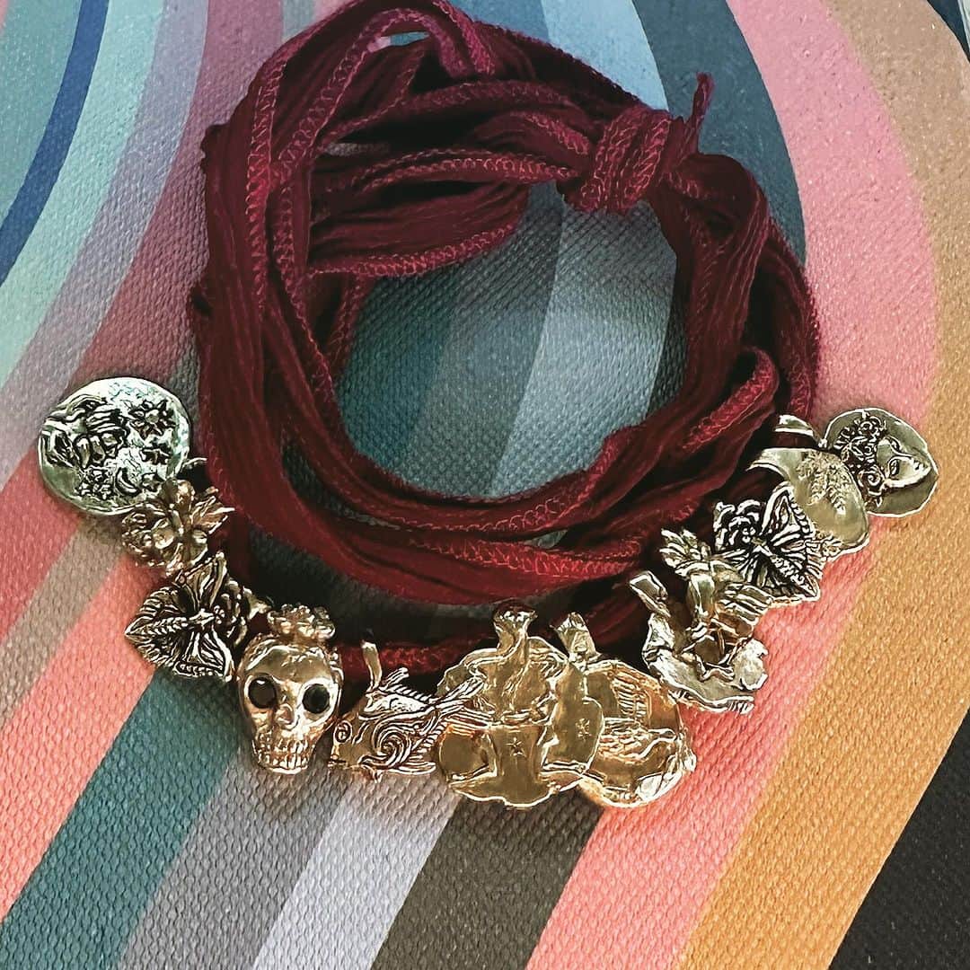 キャサリン ミッシェルのインスタグラム：「Feel free to adorn yourself with as many charms as you need for healing, protection, manifestation, inspiration and more. Authentic is the word I would use to describe my work. Made in our family workshops since 2002. We can’t fix the world but we love to bring little things to bring you joy. Shown here some our our gold charms. #jewelryasmedecinecm #protection #peace&health #smallgoldtreasures #iconicsince2002 #madeinUSA #goldcharms #visionary #manifestation #spirited」