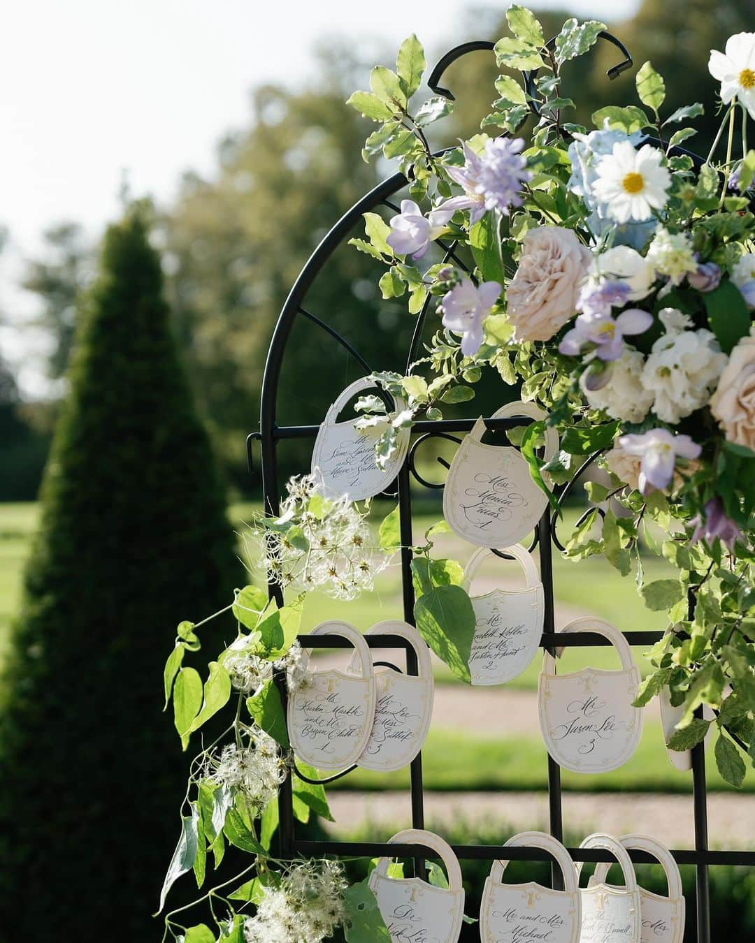 Veronica Halimさんのインスタグラム写真 - (Veronica HalimInstagram)「Sophie & David's wedding day was effortlessly soft and romantic with Parisian influences. Light colors of sage, French green, lilac, French blue, and muted dusty blue were infused in the decor in a way that remained classic — achieving a timeless yet stately aesthetic.  @capucineatelierfloral exceptionally complemented the aesthetic with gorgeous blooms that elevated the decor while the menus and escort display by @truffypi beautifully enhanced the Parisian elements.  Planning and Design @laurynprattes | Photography @abbyjiu | Venue @chateau_de_villette | Caterer @grandchemintraiteur | Beauty Team @alesiasolo_muah | Florals @capucineatelierfloral | Stationery @truffypi | Rentals @nuagedesignsinc @theonicollection @maison_options | Decor @atawaevent | Cake @syniesparis | Entertainment @damien.keys | Transportation @blackroadlimo | Bride @sgeschwind13   #pariswedding #parisfrance #chateaudevillette #chateaudevillettewedding #realbride #francewedding #weddingvenues #franceweddingvenue #luxuryeventplanning #destinationwedding #weddingflowers #weddingtable #luxurywedding #weddingdetails #weddingdecor #receptiondecor #weddingday #weddingideas #weddingdecoration #weddinginspiration #weddingcenterpiece #weddingflowers #weddingtent #gardenwedding #tentedwedding #outdoorwedding #eventdesign #weddingphotography #eventdecor #weddingwednesday」10月14日 4時09分 - truffypi