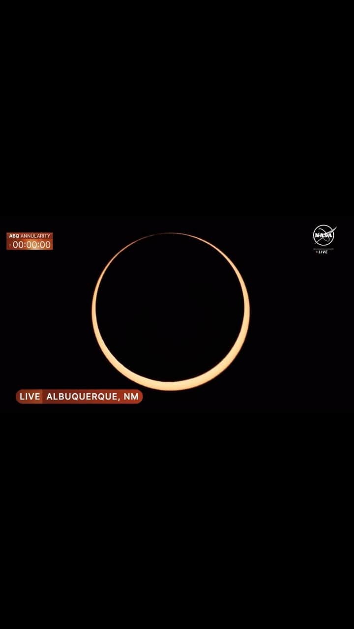 NASAのインスタグラム：「Missed the eclipse? Want to relive it? Like the Moon in front of the Sun, we’ve got you covered.  On Oct. 14, 2023, an annular, or “ring of fire,” solar eclipse passed over parts of North, Central, and South America. An annular eclipse occurs when the Moon passes between the Earth and the Sun. Unlike in a total solar eclipse, where the Moon covers up the Sun completely, the Moon is just distant enough during an annular eclipse to allow a thin bright ring of Sun to shine through.  This clip shows the ring of fire as it passes over Albuquerque, New Mexico. Our 2023 annular eclipse show featured live views from California to Texas, interviews with scientists and NASA astronauts, and a sneak preview at the total solar eclipse set to cross over North America in April 2024. Watch the full program at youtube.com/NASA.  Visual description: A telescope view of the annular solar eclipse shows the Moon as a black sphere moving across the slightly larger gold disc of the Sun, blocking most of the Sun, leaving only a thin crescent and then ring of light. An inset video feed shows the reactions of two NASA commentators, both wearing solar-safe glasses, and looking up at the eclipse.  Credit: NASA  #NASA #Space #Eclipse #AnnularEclipse #Eclipse2023 #SolarEclipse #EclipseSolar #ringoffire」