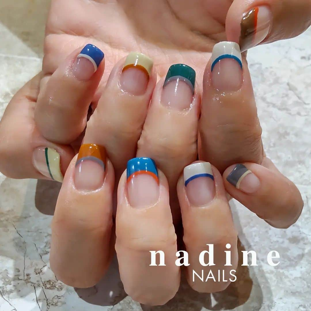 nadineNAILSのインスタグラム：「ショートで可愛いカラフルフレンチ♡  持ち込み画像アレンジになります😙  #nailart #nailstagram #nails #art #instnailstyle # #japanstyle  #originalnails #gold#silver#美甲 #gelnails #gel甲 #ニュアンスネイル#girlsfashion #ミラーネイル  #clearnails #フレンチネイル#リングネイル #ワンホンネイル#pedicure #スキニーフレンチネイル #秋色ネイル#マグネットネイル#グラデーションネイル#韓国ネイル#韓国コスメ#ツイードネイル#カラフルフレンチネイル#白グラデーションネイル  nailsheet @lavankomono」