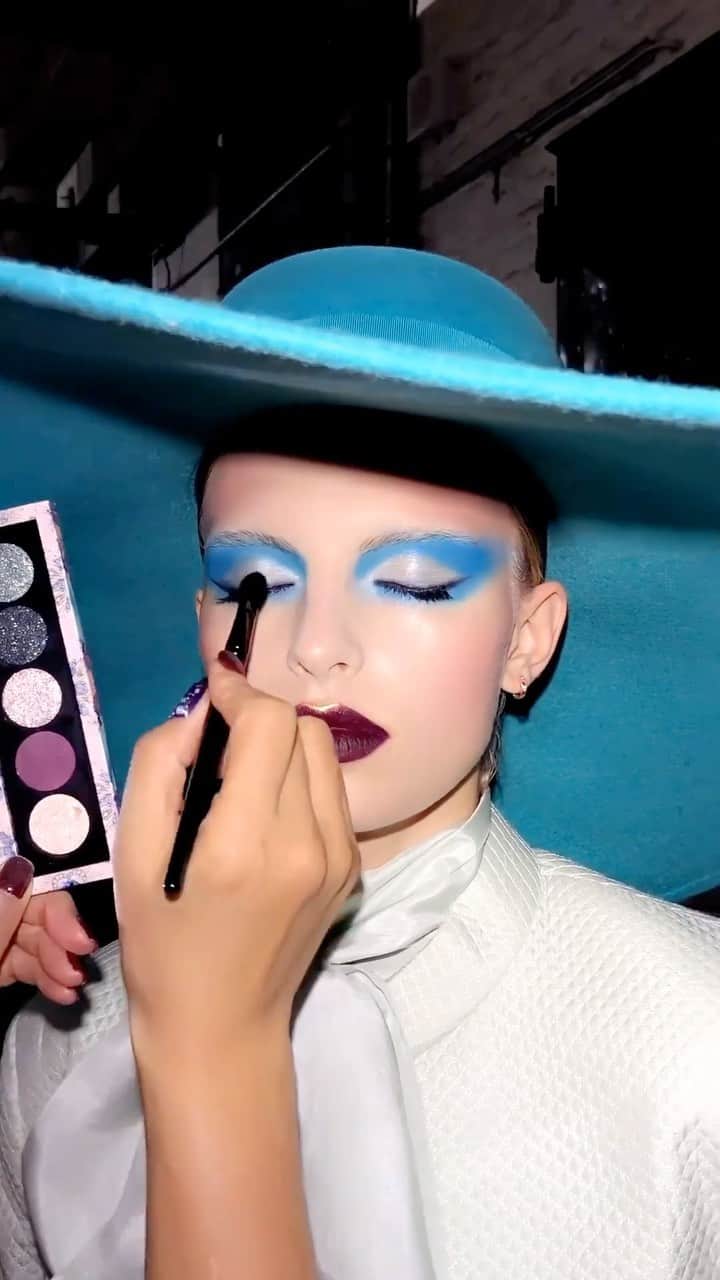 パット・マグラスのインスタグラム：「LUNAR NIGHTSHADE ✨💎✨ @karoodoo dazzled at @voguemagazine’s #VogueWorld London 2023 with the NEW LIMITED EDITION #Holiday2023 Bijoux Brilliance Eye Shadow Palette: Lunar Nightshade. Experience high-definition shades, fade-proof wear, and silky-smooth application.✨💎✨ SHOP NOW at PATMcGRATH.COM.  ⚡️STARRING ⚡️ FACE Divine Skin: Rose 001™ The Essence Skin Fetish: Sublime Perfection Primer Skin Fetish: Sublime Perfection Foundation Skin Fetish: Sublime Perfection Setting Powder Skin Fetish: Highlighter + Balm Duo  Divine Blush: Legendary Glow Colour Balm ‘DIVINE ROSE’  MatteTrance Lipstick™ ‘POLAROID PINK’ Skin Fetish: Divine Blush ‘DIVINE ROSE III’ & ‘CHERISH’ Divine Blush + Bronze + Glow Trio: Supernova Siren ‘MIDNIGHT ORCHID’ & ‘SOLAR FANTASY’  EYES  PermaGel Ultra Glide Eye Pencil  ‘BLITZ BLUE’ & ‘XTREME BLACK’  Bijoux Brilliance Eye Shadow Palette: LUNAR NIGHTSHADE  ‘NEPTUNIAN ORCHID’ Mothership I: Subliminal  ‘BLITZ BLUE’ Dark Star Mascara   LIPS  PermaGel Ultra Lip Pencil  ‘BLOOD LUST’ MatteTrance™ Lipstick  ‘ELSON’ ELSON & ‘VENDETTA’」