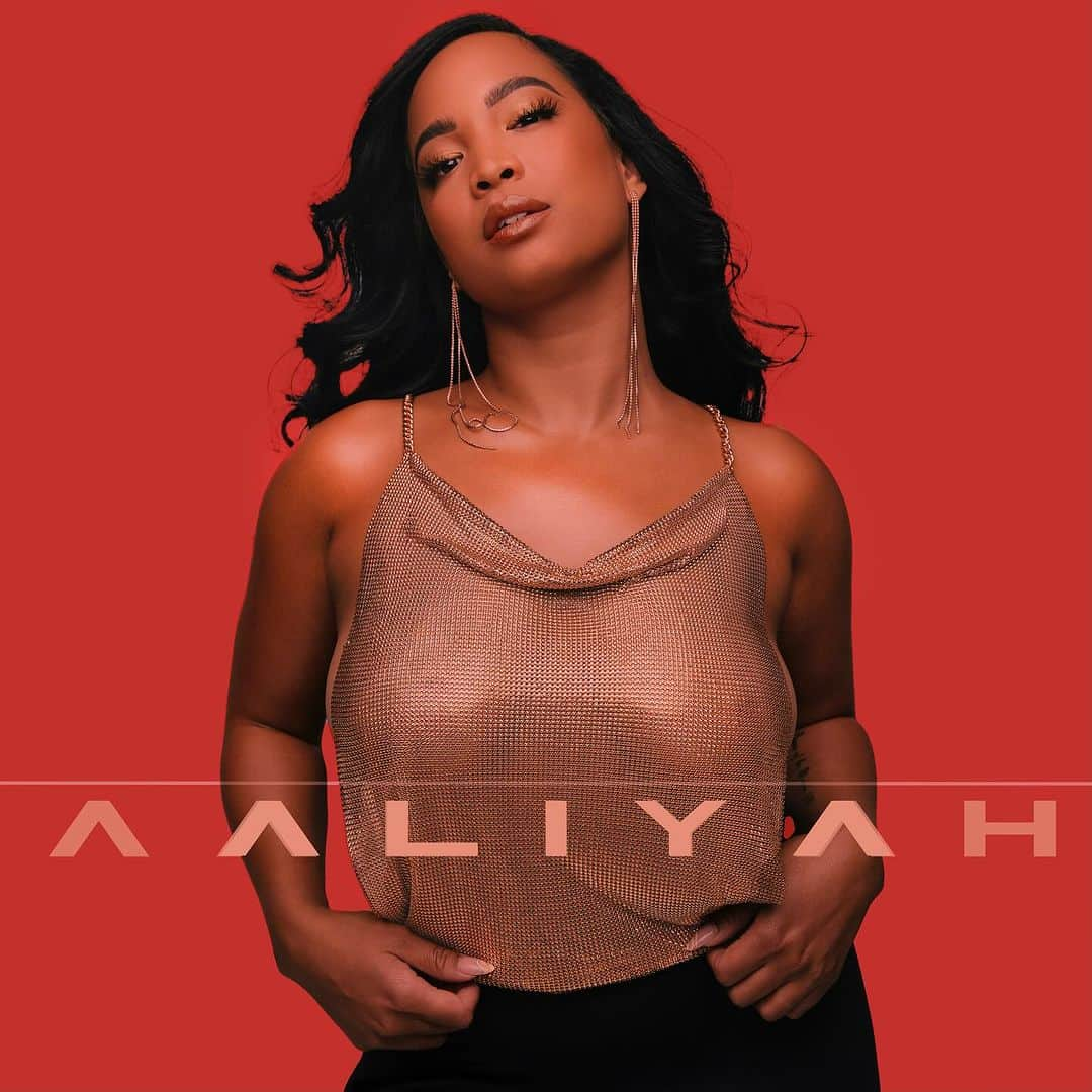 アリーヤ・ジャネルのインスタグラム：「I used to lie to my friends in elementary and say that this was me singing😂 And if they didn’t believe me, I’d show them my name on this cover. RIP to our queen #aaliyah 🕊️🖤   📸 and edited by @alissarosestudio」