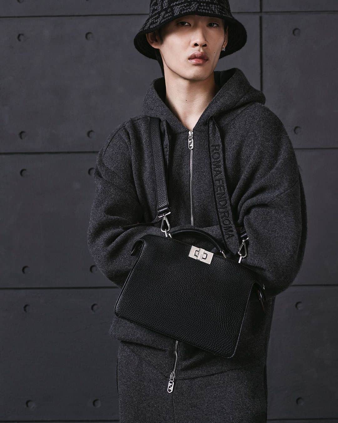 Fendiのインスタグラム：「The icon proves its shapeshifting ability.  Shop timeless iterations of the #FendiPeekaboo in Cuoio Romano leather now in boutiques and at Fendi.com.  Artistic Director of Accessories and Menswear: @silviaventurinifendi  Artistic Director of Jewellery: @delfinadelettrez   Styling: @ganio Hair: @ramoneyluv Makeup: @samiamohsein  Casting: @piergiorgio Model: Shaoqi Zeng  Photography: @brunostaub」