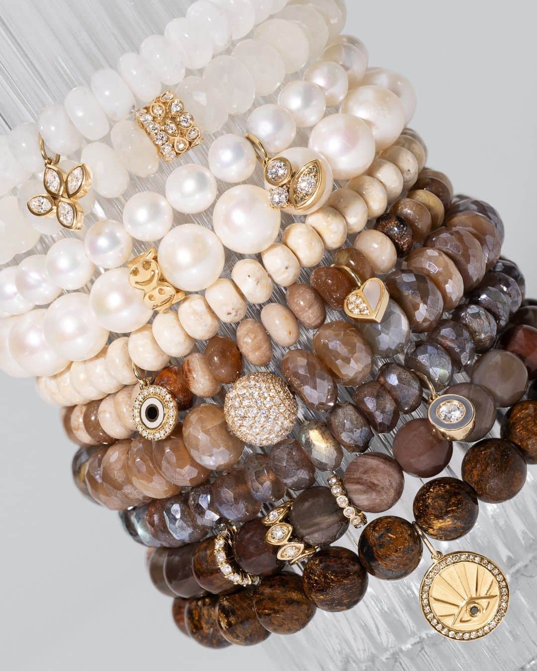 のインスタグラム：「The Stack Of The Season 🤎 Keep it neutral with our collection of semi-precious stone beaded bracelets featuring new arrivals like our Marquise Eye Flower on Moonstone and Mini Heart Opalite. Which is your fav? #SydneyEvan」