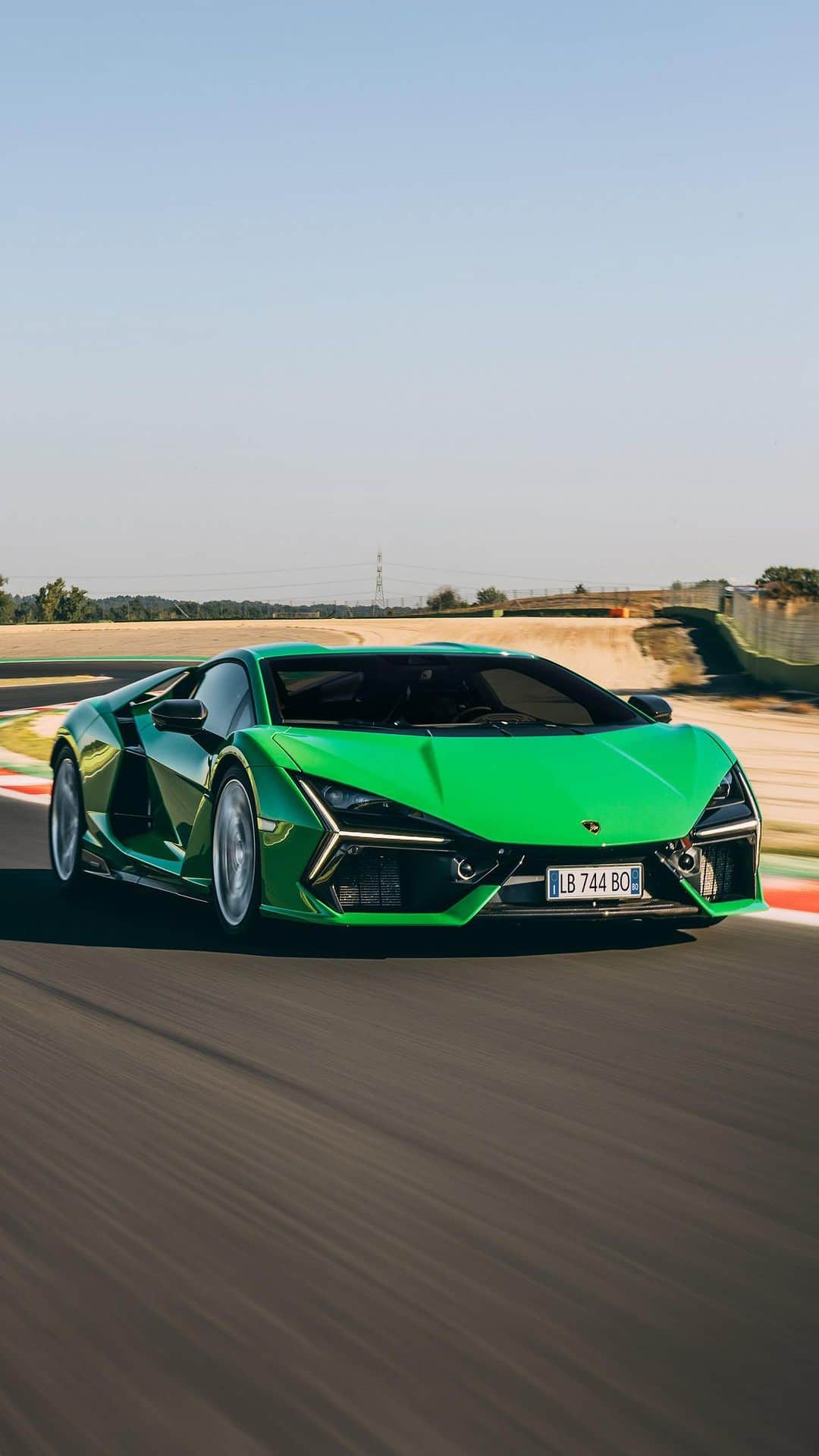 ランボルギーニのインスタグラム：「The overwhelming roar of the V12. The innovative energy of its electric motors. For the first time on the road and track, Lamborghini Revuelto showcased all its strength and cutting-edge performance, embarking on a journey through the streets of Bologna all the way to the Piero Taruffi Vallelunga circuit, near Rome.   #Lamborghini #Revuelto #FromNowOn  __  The vehicle is not yet offered for sale and is therefore not subject to Directive 1999/94/EC. The fuel consumption and emissions data is in the type approval stage」
