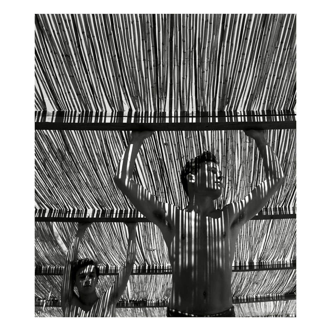 Magnum Photosさんのインスタグラム写真 - (Magnum PhotosInstagram)「“Photography is about light. There is nothing artificial about it. The magic of the moment cannot be artificially created because light comes from the sun and magnifies the small details of life.” – Larry Towell (@larrysgeneralstore)  In exploring the theme Written by Light, a selection of photographs featured in the Square Print Sale curation celebrate the authenticity of light in harmonious tandem with its counterpoint, shadow.   Guy Le Querrec captures a stream of light in the form of molten metal, bursting unapologetically from a furnace as workers heat instruments in its imposing glow.  In a testament to her faith and mission, a photo from Larry Towell sees a pilgrim lighting a candle in the Church of the Holy Sepulchre, Jerusalem, cast in a ray of light cascading from above.  A dream-like image by Erich Hartmann depicts a pillow atop a bed illuminated by a misshapen grid of light, invoking a surreal allure of repose to the viewer.  🔗 Browse the collection, curated in collaboration with @worldpressphoto, for one week only at the link in the @magnumphotos bio.  Magnum Photos and World Press Photo will be donating a portion of the profits from the sale to the International Committee of the Red Cross (ICRC).  PHOTOS (left to right):  (1) Young men under a reed roof. Torremolinos, Spain. 1951. ©  @herbert_list / Magnum Photos  (2) Atatürk Mausoleum. Ankara, Turkey. 1954. © George Rodger / Magnum Photos  (3) In church. Peki’in, Israel. 1957. © @michabaram.archive / Magnum Photos  (4) Horse and wheels. Old Delhi, India. 1966. © @raghurai.official / Magnum Photos  (5) Forges et Laminoirs steel factory in Saint-Brieuc. Côtes-d’Armor. Brittany, France. March 1973. © Guy Le Querrec / Magnum Photos  (6) Jerusalem, Israel. 1956. © Inge Morath / Magnum Photos  (7) Soldiers search bus passengers along the Northern Highway. El Salvador. 1980. © @susanmeiselas / Magnum Photos  (8) Pilgrim. Church of the Holy Sepulchre. Jerusalem. 2000. © Larry Towell (@larrysgeneralstore) / Magnum Photos  (9) Artist and photographer Mikhael Subotzky, during the 70th Magnum AGM in New York, USA. 2017. © @jeromesessini / Magnum Photos  (10) Maine, USA. 1975 © Erich Hartmann / Magnum Photos」10月16日 23時01分 - magnumphotos
