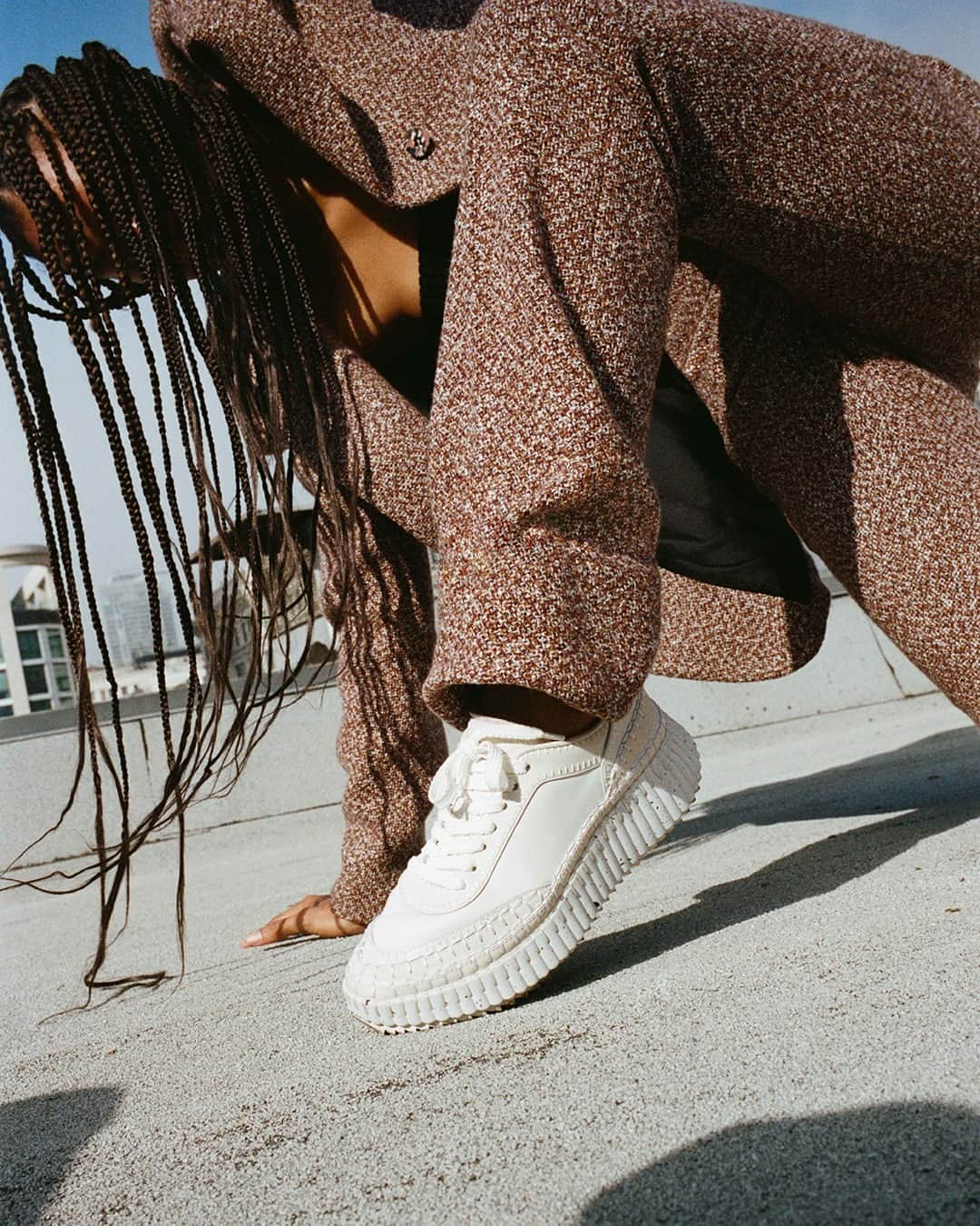 Chloéさんのインスタグラム写真 - (ChloéInstagram)「Introducing the new white leather Nama sneaker, which debuts in a film directed by @claracullen and a series of photographs by @maxfarago shot on location in Los Angeles – both featuring dancer @thelastbirdinthesky.   With its hand-stitched welt, recycled sole and lower impact materials, the new leather Nama develops the signatures of the classic design.  The leather Nama sneaker is available on Chloe.com.」10月17日 0時00分 - chloe