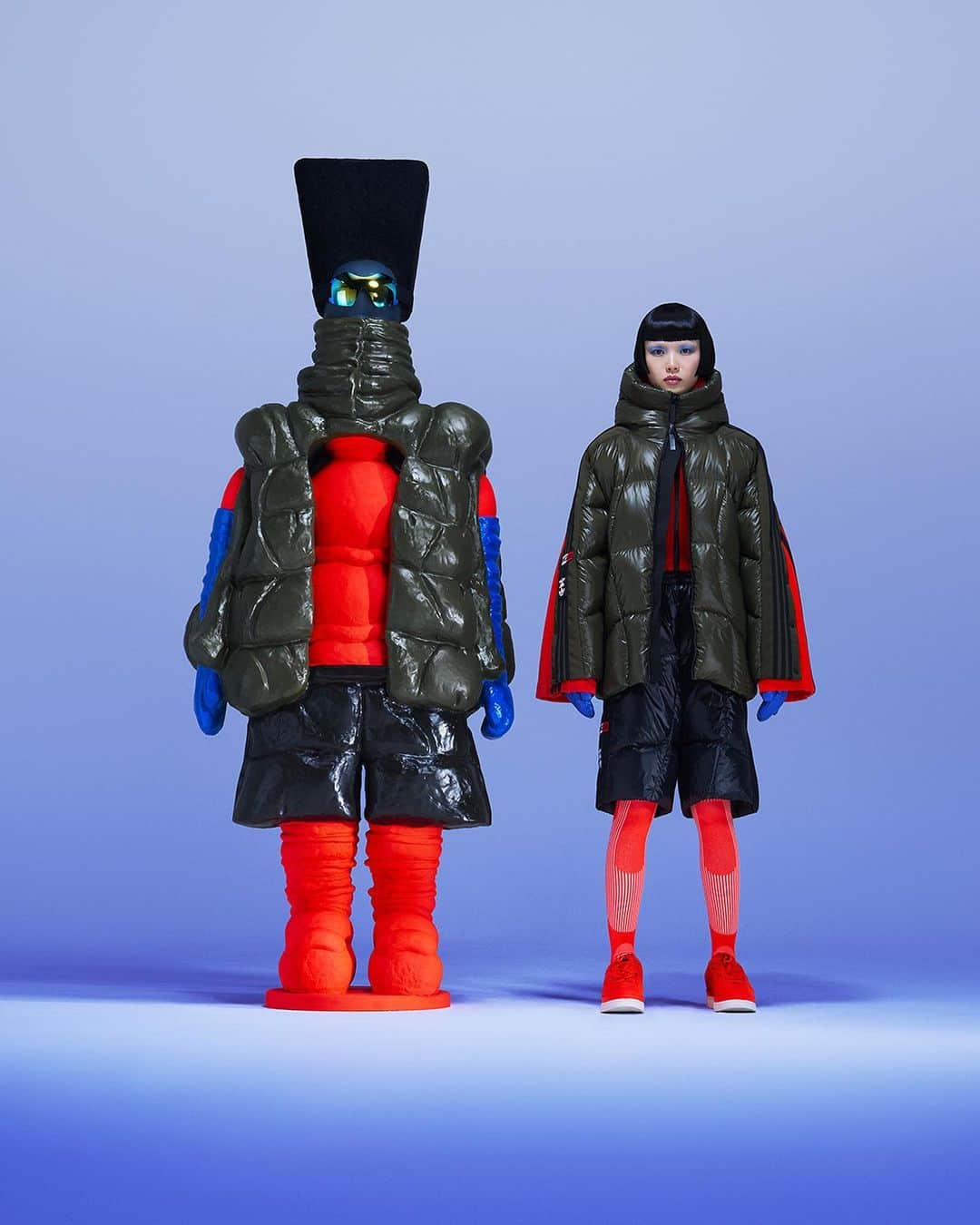 モンクレールのインスタグラム：「A new meeting of worlds, made for exploring.   @ibbynjoya’s explorer sculpture and human counterpart find balance in textures and volumes of traffic light red and and forest green.  Discover Moncler x @adidasoriginals now on moncler.com.   #MONCLERADIDASORIGINALS  #MONCLERGENIUS」