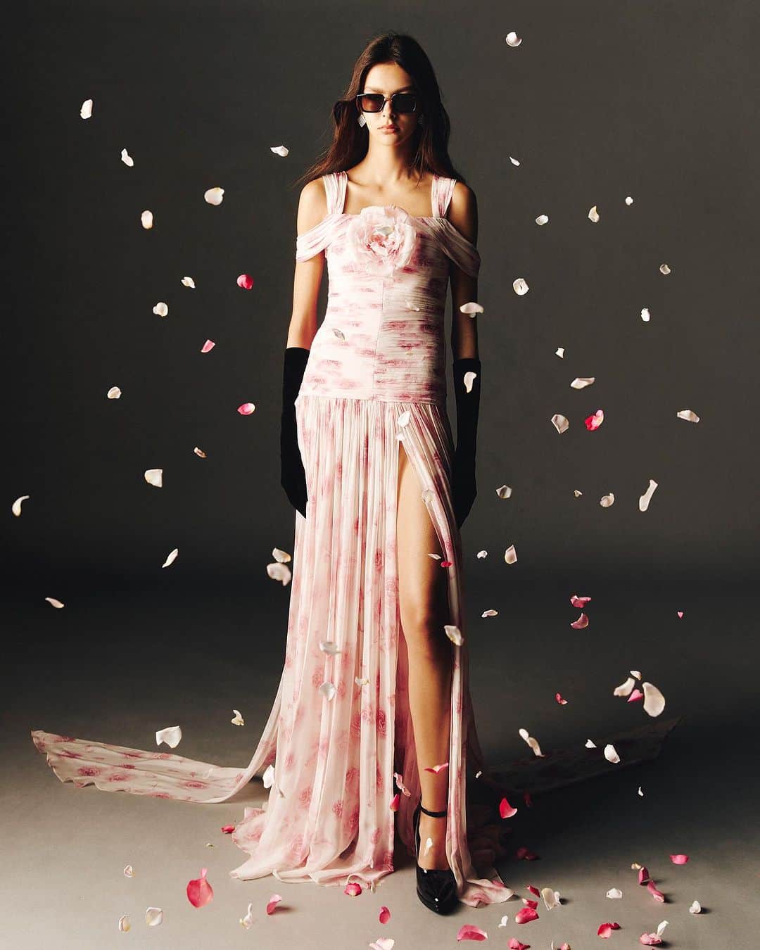 Sretsisのインスタグラム：「Kiss me Kate. Named after the climbing rose, this made-to-order ruched evening dress with wispy panels and hand-crafted rosette is made with 100% Rose Petal Georgette. Using 100 roses to make 1 meter of fabric, this sensual gown showcases Sretsis’ strive for novelty fabric development and craftsmanship. For more information contact Sretsis Flagship at 02 160 5874.」