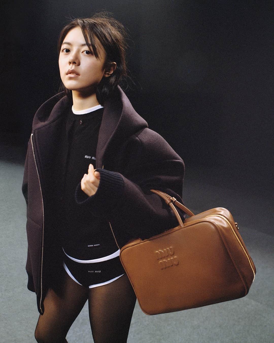 のインスタグラム：「Signature cashmere panties are exposed, subverting the notion of normally hidden.   Featuring Zhao Jinmai (@jinmai_z). Photographed by @ZoeGhertner. Creative direction by @EdwardQuarmby. Styled by @LottaVolkova.  #MiuMiuLIVE #MiuMiuFW23」