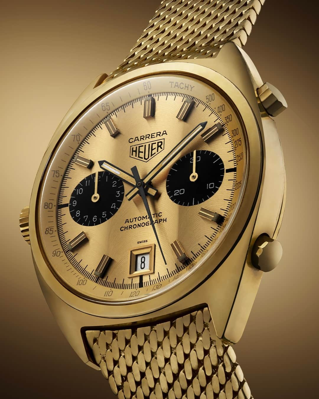 タグ・ホイヤーのインスタグラム：「Delve into the legacy of the Heuer Carrera 1158CHN.⁣ ⁣ This horological masterpiece pays reverent homage to Jack Heuer's pioneering tradition of gifting gold timepieces engraved with the names of racing champions, like Ronnie Peterson.⁣ These golden watches embody the essence of triumph, determination, and an unwavering quest for excellence. Each tick of the chronograph resonates with the spirit of a racer's courage, serving as a timeless reminder of their journey to success.⁣ ⁣ Mark your calendar for tomorrow (October, 18th) at 11 AM CET for an exciting reveal!⁣ #TAGHeuer #TAGHeuerCarrera⁣」