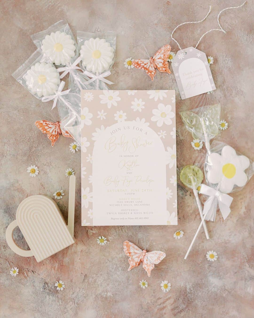 Ceci Johnsonさんのインスタグラム写真 - (Ceci JohnsonInstagram)「BABY SHOWER | Presenting our couture invitation for Kaytlin’s baby shower. The design incorporates lovely daisy watercolors printed on 4-ply luxe paper, inviting guests to partake in the blooming journey of love and anticipation. Adorned with a soft blush ribbon, it carries a delicate paper butterfly, symbolizing the grace and transformation that a new life brings.  #CeciCouture ⠀⠀⠀⠀⠀⠀⠀⠀⠀ CREATIVE PARTNERS Invitation: @cecinewyork Photographer: @kelseylanaephotography  Florals: @poppylanedesign  Cookies: @meant2bbakery  ⠀⠀⠀⠀⠀⠀⠀⠀⠀ #cecinewyork  #coutureinvitation  #babyshowerinvitation  #daisyinvitation #beautifulstationery」10月17日 22時26分 - cecinewyork