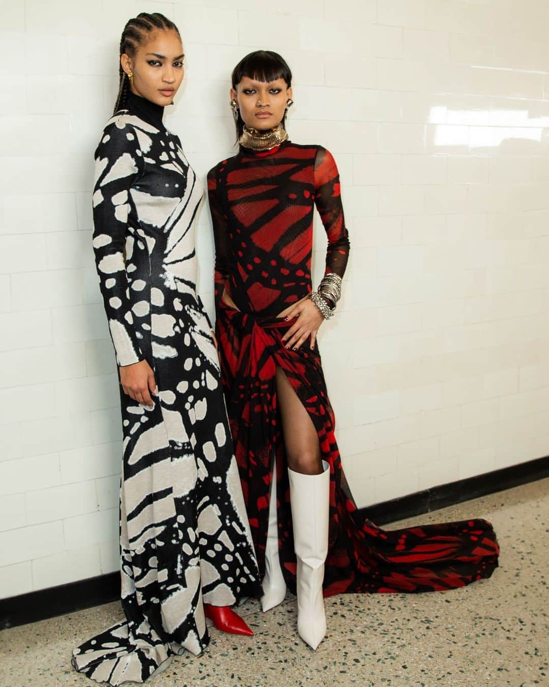 プラバルグルンのインスタグラム：「Alluring Abstracts⁠ ⁠ Ivory and Black Butterfly Jacquard Long Sleeve Knit Gown and the Scarlet Butterfly Printed Mesh Bodysuit with Scarlet Butterfly Printed Mesh Draped Skirt from the Fall Winter 2023 collection⁠ ⁠ Photo by @alec_kugler」