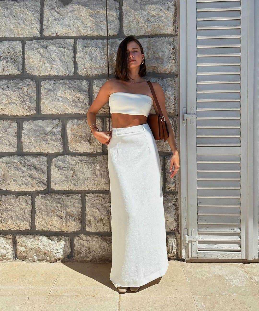 KOOKAI のインスタグラム：「Muse @prudencekate snapped in the best-selling Oyster Midi Skirt •• Available in boutiques and online #kookai」