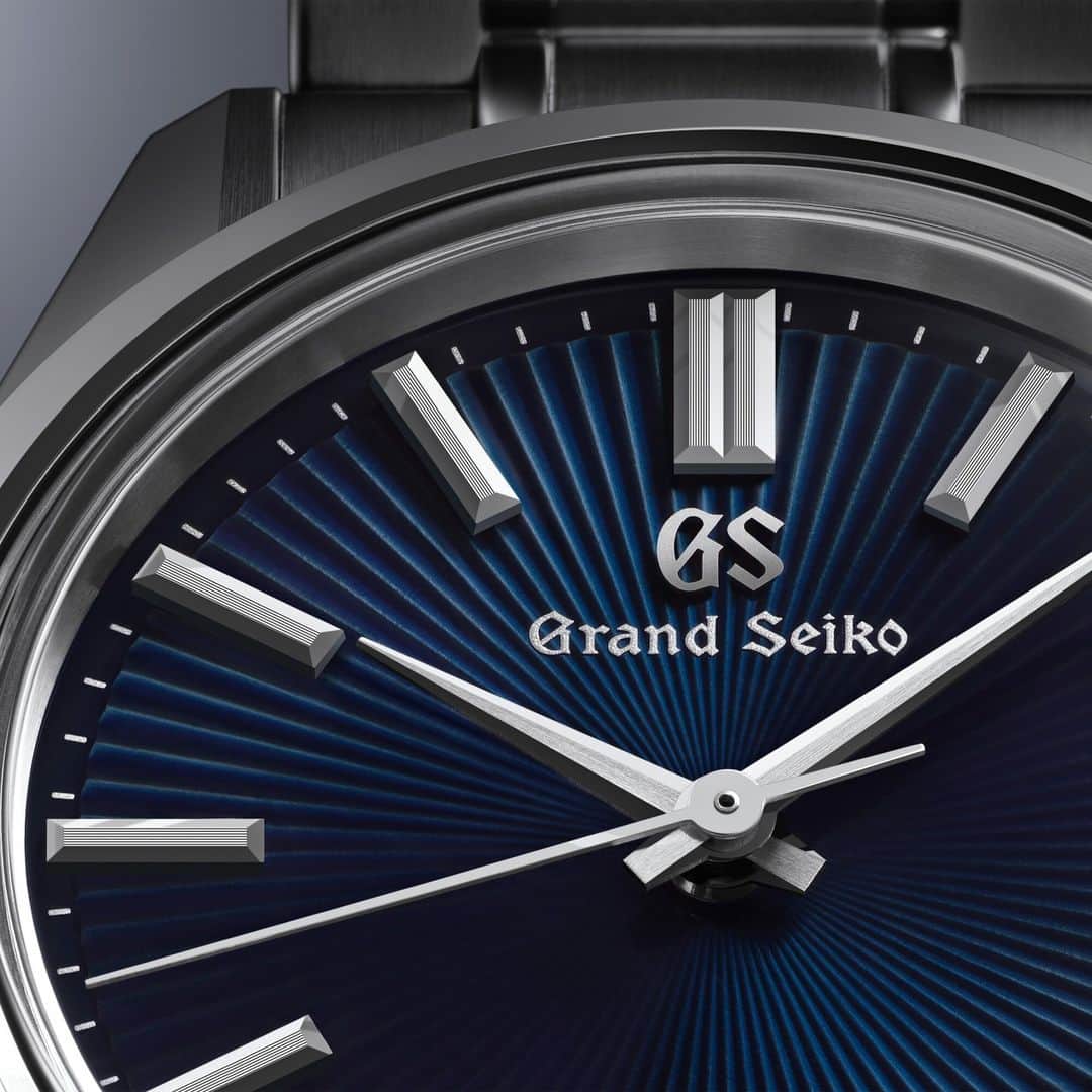 Grand Seikoのインスタグラム：「【New product】 #SBGW299 #SBGW297   The Grand Seiko Style that took shape in the 44GS finds inspiration in the straight lines and flat surfaces that can be observed in certain traditional Japanese objects, including paper sliding doors, folding screens, and folding fans, and this was the direction that was chosen for this watch’s dial as well. Its radiating pattern is created from a series of flat surfaces reminiscent of a folding fan, harmonizing with the 44GS case in a design that points to the roots of the Grand Seiko Style.  The color of the dials are available in two types: The dark-blue dial and the white dial with a vivid blued steel seconds hand.  #grandseiko #thenatureoftime #aliveintime」