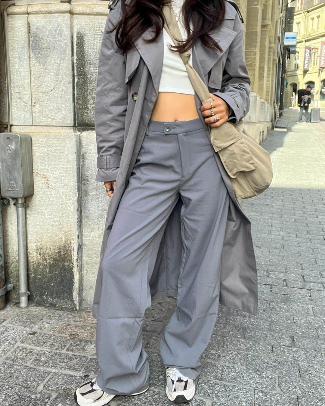 TALLY WEiJLのインスタグラム：「grey days won't stop us from serving 💅🩶⁠ Tap to shop the look as seen on the icon @annadinh97 ⁠ ⁠ Trench Coat🔎 647954⁠ Trousers🔎 643500」