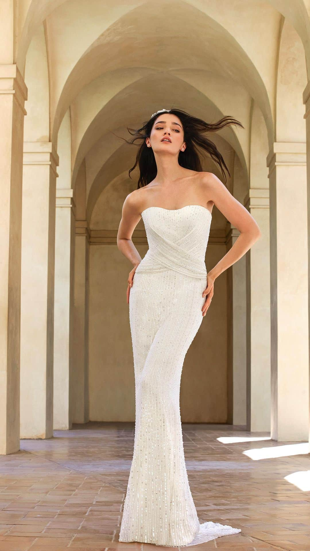 ジェニーパッカムのインスタグラム：「Mia, sculptured style from the 2024 White Edit Wedding Collection. In store and online now.   Jewellery: Jenny Packham x Helzberg Diamonds  #jennypackham #bride #wedding #bridetobe #bridedress #bridal #wedding #weddingdress #weddings #weddinginspiration #weddingideas #style #hollywood」