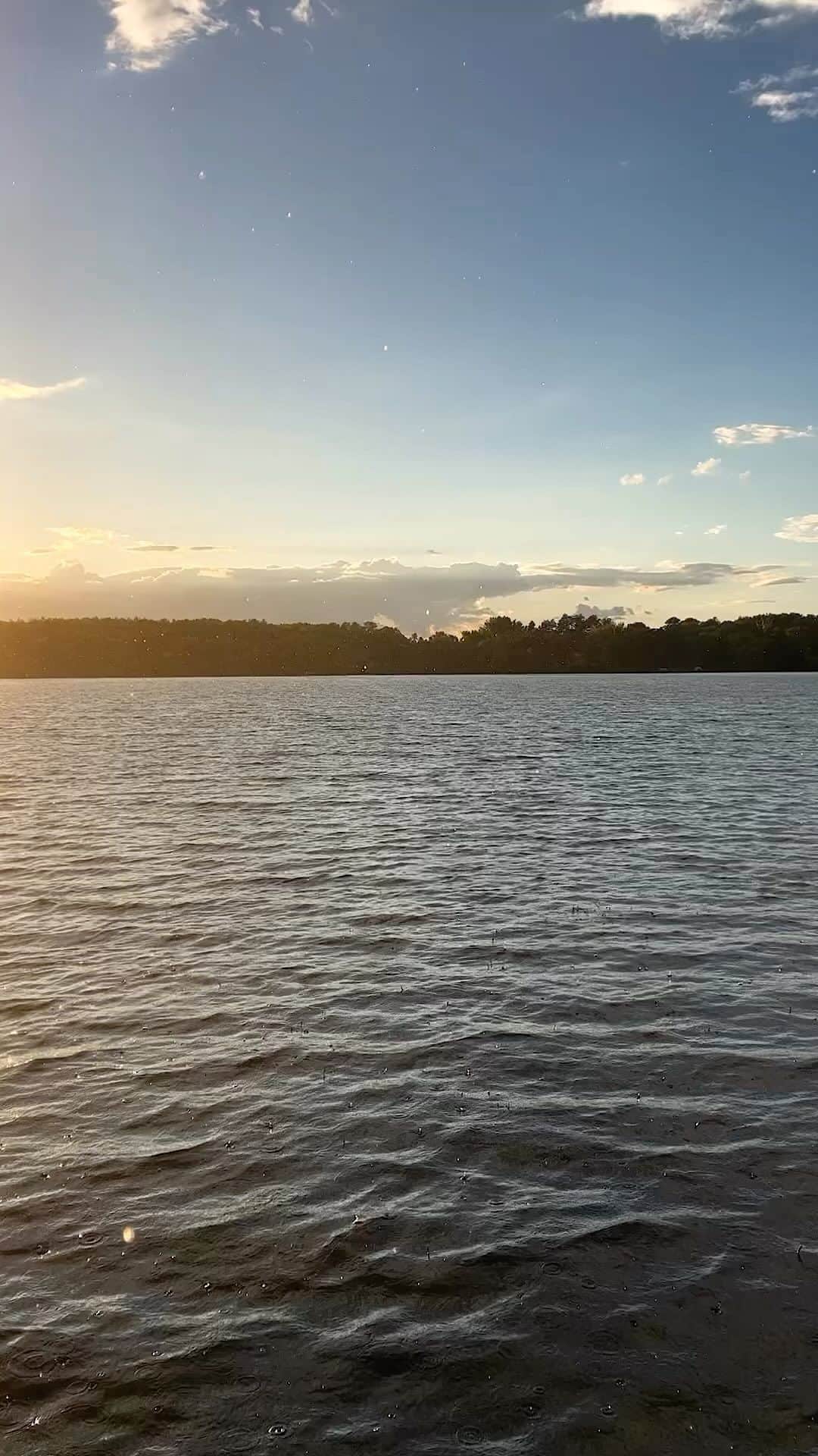 National Geographic Travelのインスタグラム：「Video by @sarah_stacke | Light rain at sunset creates a spellbinding and magical moment at the aptly named Fairy Lake in northern Minnesota.  See more remarkable places and people @sarah_stacke.」