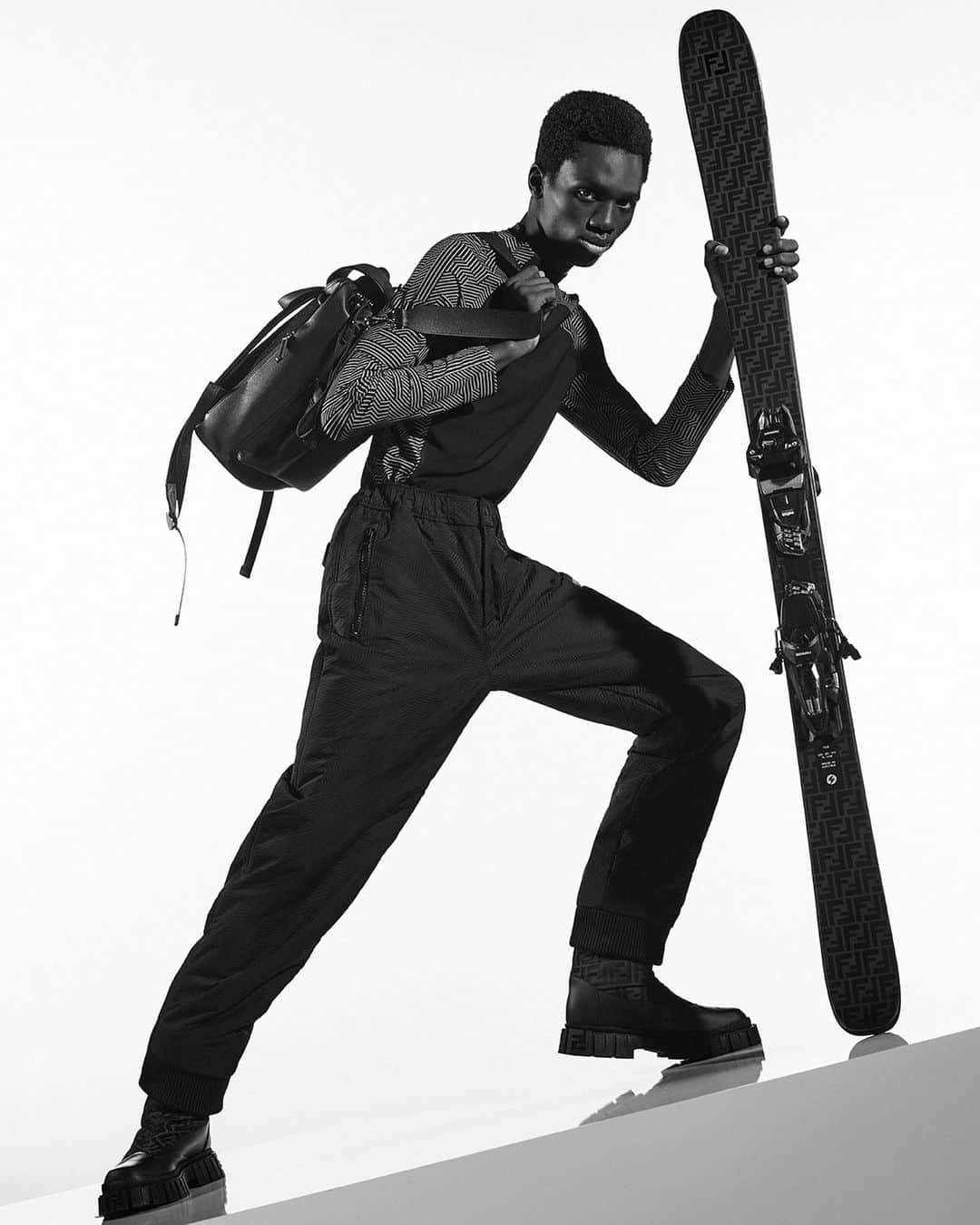 Fendiのインスタグラム：「The Maison's mastery of materials reaches new heights in Fendi Skiwear.  Shop now in select boutiques and at Fendi.com.  Artistic Director of Accessories and Menswear: @silviaventurinifendi  Artistic Director of Jewellery: @delfinadelettrez   Styling: @ganio Hair: @ramoneyluv Makeup: @samiamohsein  Casting: @piergiorgio Model: Hamaam Pelewura  Photography: @brunostaub」
