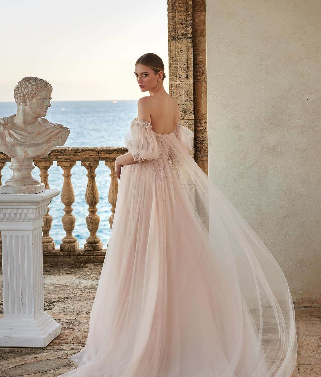 Pronoviasのインスタグラム：「Whether it’s the ethereal touch of delicate lightweight laces or the modern allure of 3D flower applications, find the gown of your dreams in our #Olympia collection ✨  1- Bloom 2- Carites 3- Edesia 4- Elpis   Discover our #Olympia collection in stores💛  @marchesafashion @marchesabridal   #Olympia #MarchesaForPronovias」