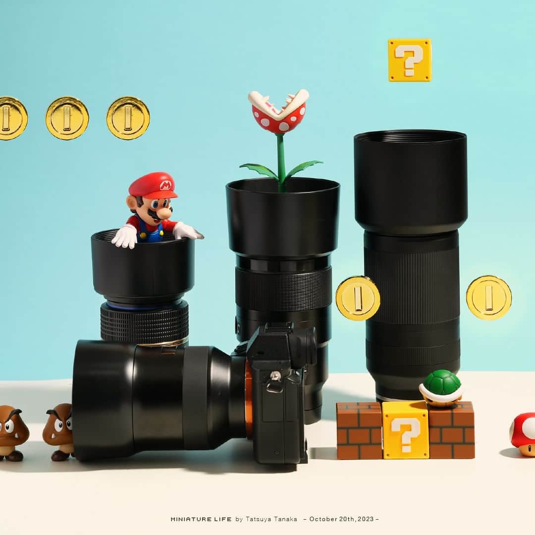 田中達也のインスタグラム：「“Pipe Lens” ⠀ ⠀ マリオがレンズにはまりおる ⠀ ⠀ ─────────────────── 《EXHIBITION info》 ⠀ 【ミニチュアライフ 神戸エアポート】 MINIATURE LIFE × KOBE AIRPORT」