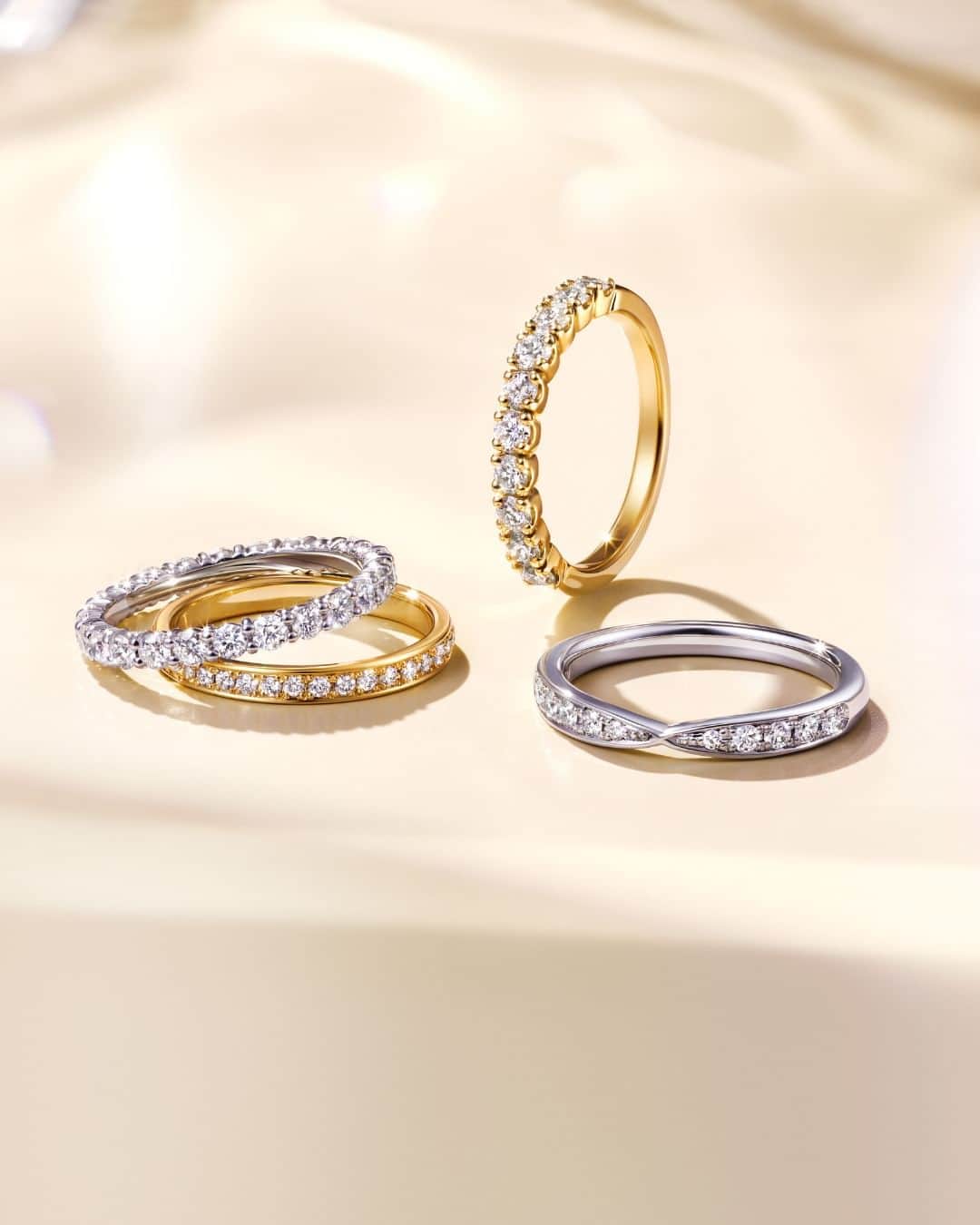 婚約・結婚指輪のI-PRIMO（アイプリモ）公式アカウントのインスタグラム：「隙間なく敷き詰められたダイヤモンドが華やかに輝く、 「永遠」を意味するエタニティリング。  婚約指輪としても、結婚指輪としても、 また、結婚5周年や10周年など特別な節目の際にご購入され、 お手持ちのブライダルリングに重ねていただく方も多くいらっしゃいます。  いつまでも続く特別な愛を象徴し、 ダイヤモンドのまばゆい光が、おふたりを祝福します。  ＜エタニティリング＞Mani Full #アイプリモ_マーニフル ＜結婚指輪＞Brigit #アイプリモ_ブリジット ＜エタニティリング＞Selene #アイプリモ_セレーネ ＜エタニティリング＞Helene #アイプリモ_ヘレネ  ーーーーー ▼アイプリモでは、ご好評のパーソナルハンド診断®を体験いただけます。 ご希望の方はホームページより来店予約をいただくとスムーズにご案内いたします。 @iprimo_official ーーーーー  #iprimo #アイプリモ #結婚指輪 #マリッジリング #エタニティリング」
