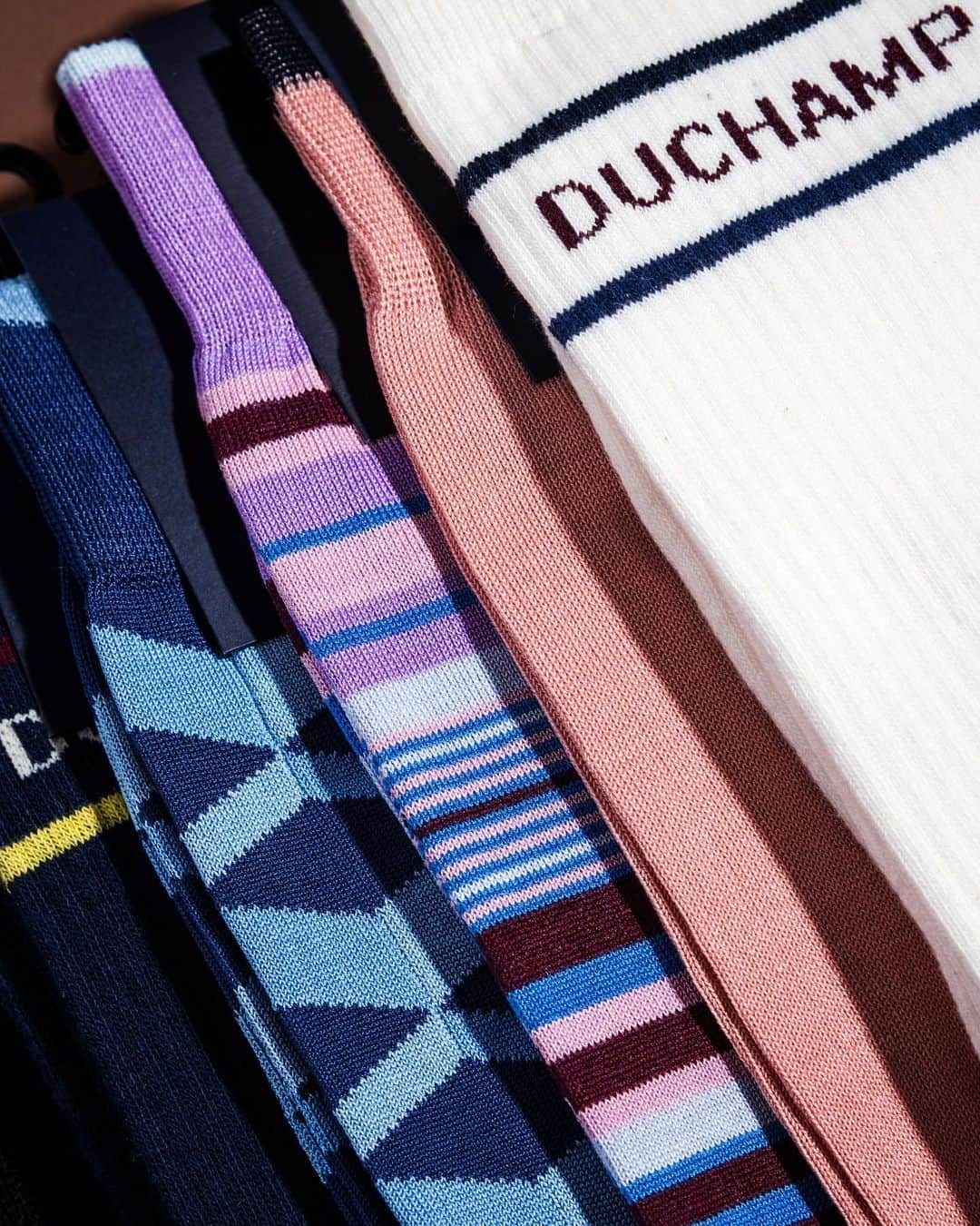 ドゥシャンのインスタグラム：「Fancy footwork… Vibrant socks to bring a charismatic touch to your seasonal wardrobe. #DuchampLondon #Menswear #modernman」