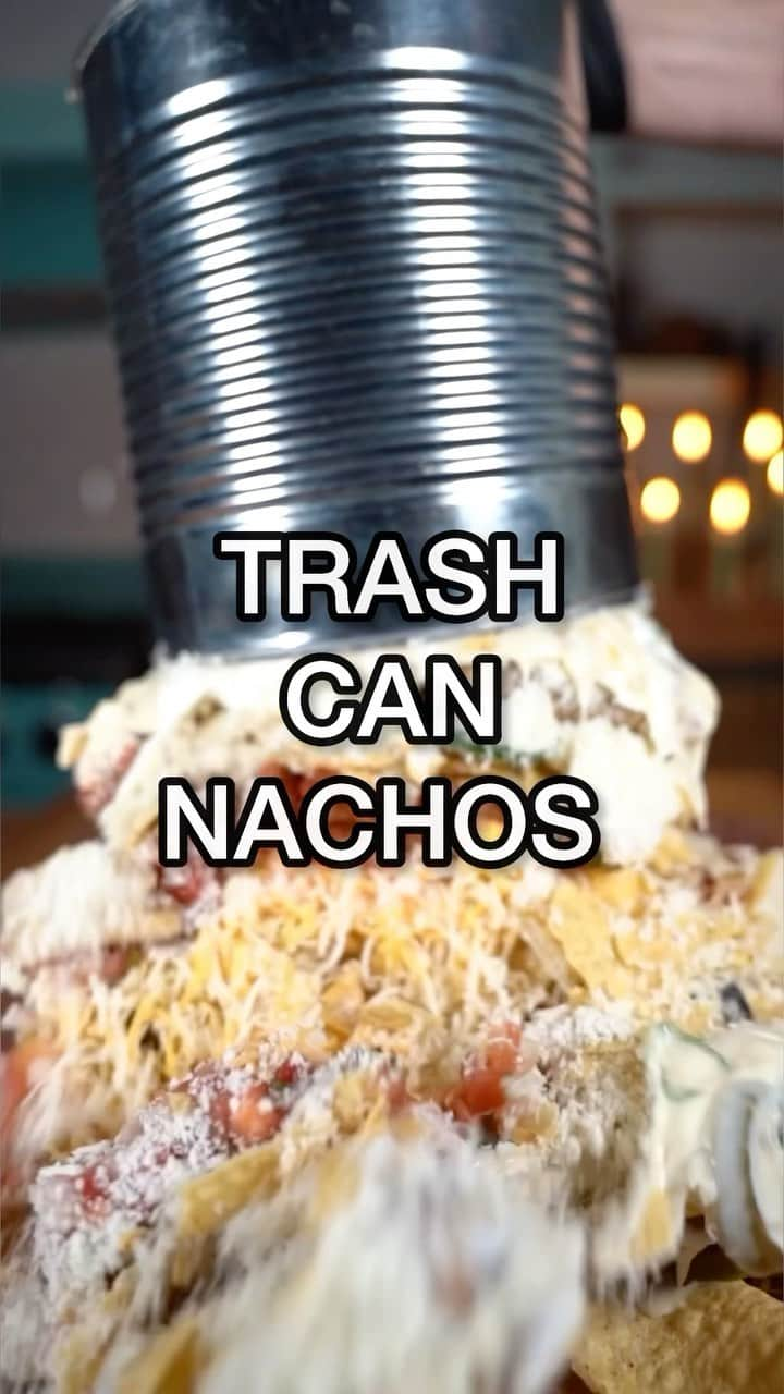 Flavorgod Seasoningsのインスタグラム：「TRASH CAN NACHOS When we saw  @guyfieri make these I knew I had to recreate them. These are absolute #flavortown   Instructions⤵️⤵️⤵️ Layering baked chicken wings from @goodlife_brands seasoned with @flavorgod Everything Spicy.   🥩You can always substitute the chicken and use ground beef!!  Layer the tortilla chips, pickled jalapeño’s, pico de gallo, cotija cheese, shredded Mexican cheese, sour cream and @arbosdip Queso Blanco in a large hollow tin can and at the end pull it up and top with chopped cilantro.  🧤 @eagleprotect_us   📸 @iron_fire_cooking @ironfiremedia   #nachos #trashcannachos #appetizers #easyappetizers  #queso #cheese #cooking #funrecipes」