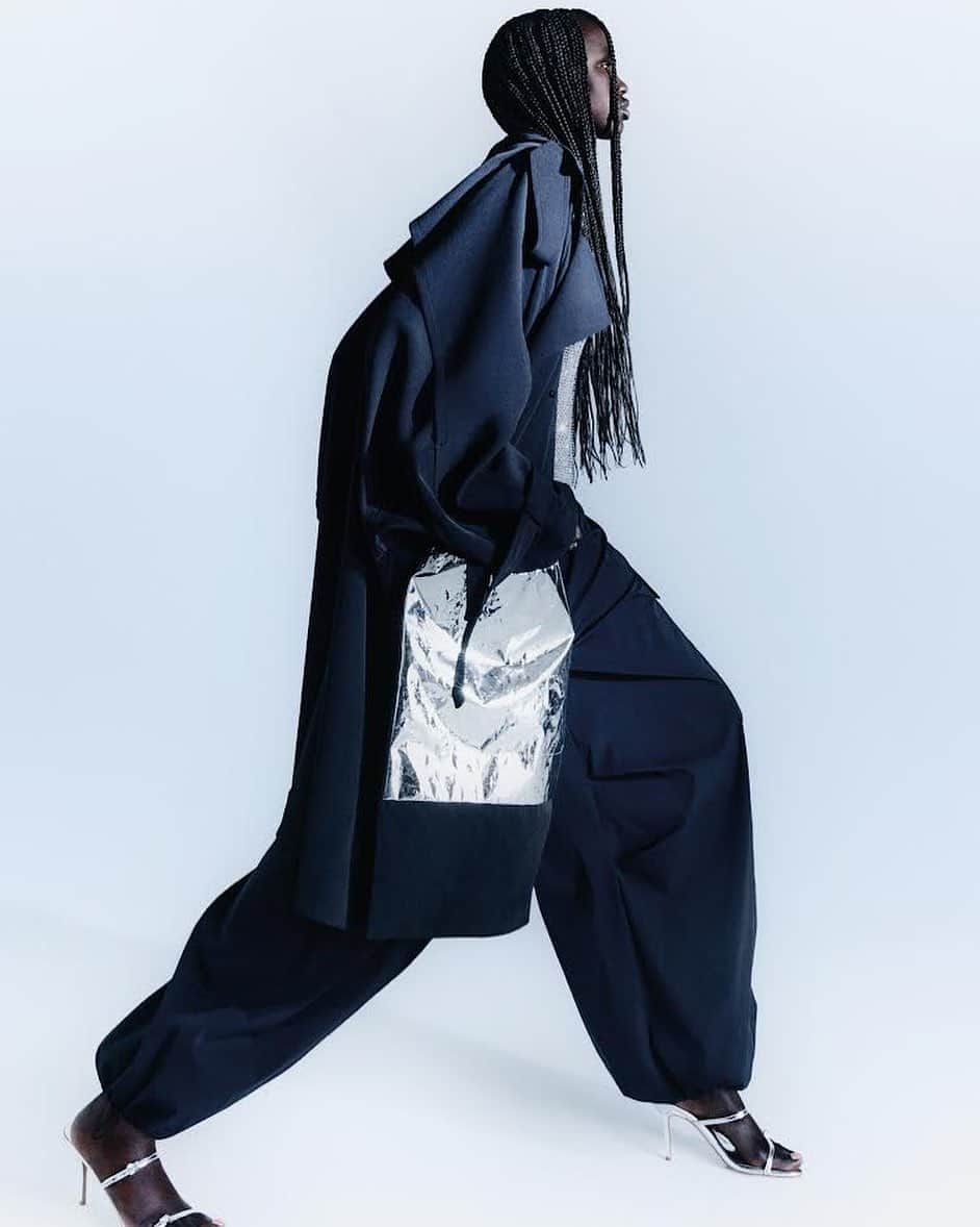 のインスタグラム：「TOGA AW23 Stretch jersey coat featured in ELLE UK.  Styling: Holly Gorst @hollygorst  Photography : Lulu McArdle @lulumcardle   Available at TOGA STORES and TOGA ONLINE STORE.  @togaarchives_online  https://store.toga.jp   #toga #togaarchives」