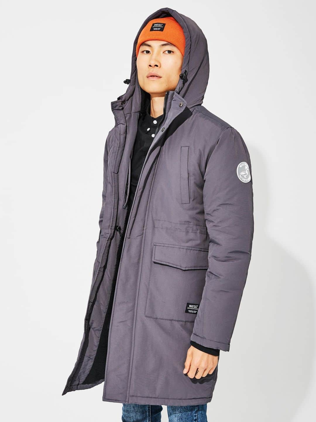 ウィーエスシーのインスタグラム：「Stay warm and stylish this winter with the WeSC heavyweight parka. This hooded wonder features a silicone exterior round label at the arm, hand warmer pockets, and an adjustable drawcord at the interior waist. With patch pockets at the waist, an adjustable hood via bungee cord, and a ribbed storm cuff, it's designed for both comfort and functionality. The sherpa lined body and padded sleeves add an extra layer of warmth. Embrace the cold in style!  Shop now at WeSC.com  • • • • • • #wesc #wesc1999 #wearethesuperlativeconspiracy #streetwear #hypebeast #hypebeaststyle #highsnobietystyle #highsnobiety #ss23」