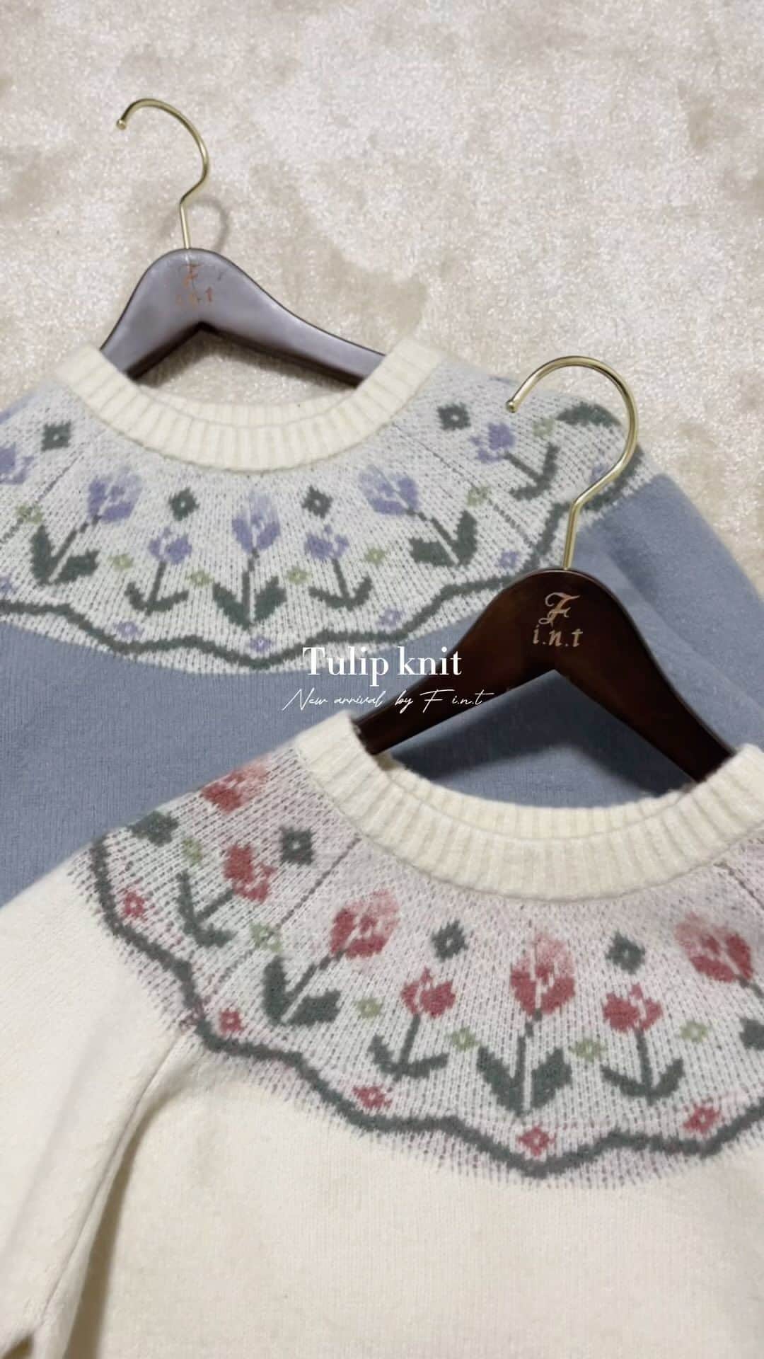 のインスタグラム：「𝕥𝕦𝕝𝕚𝕡 𝕜𝕟𝕚𝕥..🌷🤍 ⁡ レトロなチューリップ柄が目を惹く ニットプルオーバー。 華やかなカラーリングとノルディックのような雰囲気が 重くなりがちな秋冬のコーデを彩ります🎨 ⁡ - 𝘪𝘵𝘦𝘮 - ☑︎#チューリップジャガードヨークニットプルオーバー /F i.n.t  ivory / blue gray ¥8,580 (tax in) ⁡ 詳細は商品を見る💼をタップ🔍 ⁡ #fint #秋コーデ #ニット #秋ニット #レトロ #レトロコーデ #プルオーバー #チェック #チェックスカート #リール  #おすすめコーデ  #retro #reel  #retrofashion #ootd #coat .」