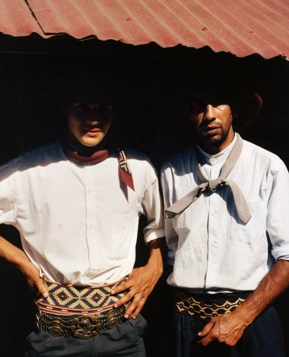 i-Dさんのインスタグラム写真 - (i-DInstagram)「An old tradition specific to Argentina, doma is several things, photographer @rodrigocarmuega tells us, “It’s the art of horse taming, but it’s also a gathering, a celebration in which these gaucho riders show their doma skills and compete with each other.” ⁠ ⁠ Comparable to the rodeos that cowboys migrate to in certain cultural pockets of North America, the exhibition aspect of doma similarly sees the gauchos – men of the pampas in South America – drape themselves in a fixed style of dress, here including shocking red boinas (berets), fajas (girdles) and loose trousers called bombachas. ⁠ ⁠ ”They’ve developed the fashion through the years,” Rodrigo says, alluding both to the gradual modernisation of gaucho fabrics and the changing role of the items they carry. “The ties around their necks have changed, and the knife, once a weapon and a tool, now is more like an ornament used to eat but also to show off. They put on their best clothes for the event and I’ve tried to show these elements.”⁠ ⁠ Hit the link in bio to read more about his documentation of the Buenos Aires horse-taming community – 'Doma'.⁠ .⁠ .⁠ .⁠ Text @zoemaywhitfield⁠ #Gaucho #BuenosAires #Doma #Photography⁠」10月22日 6時00分 - i_d