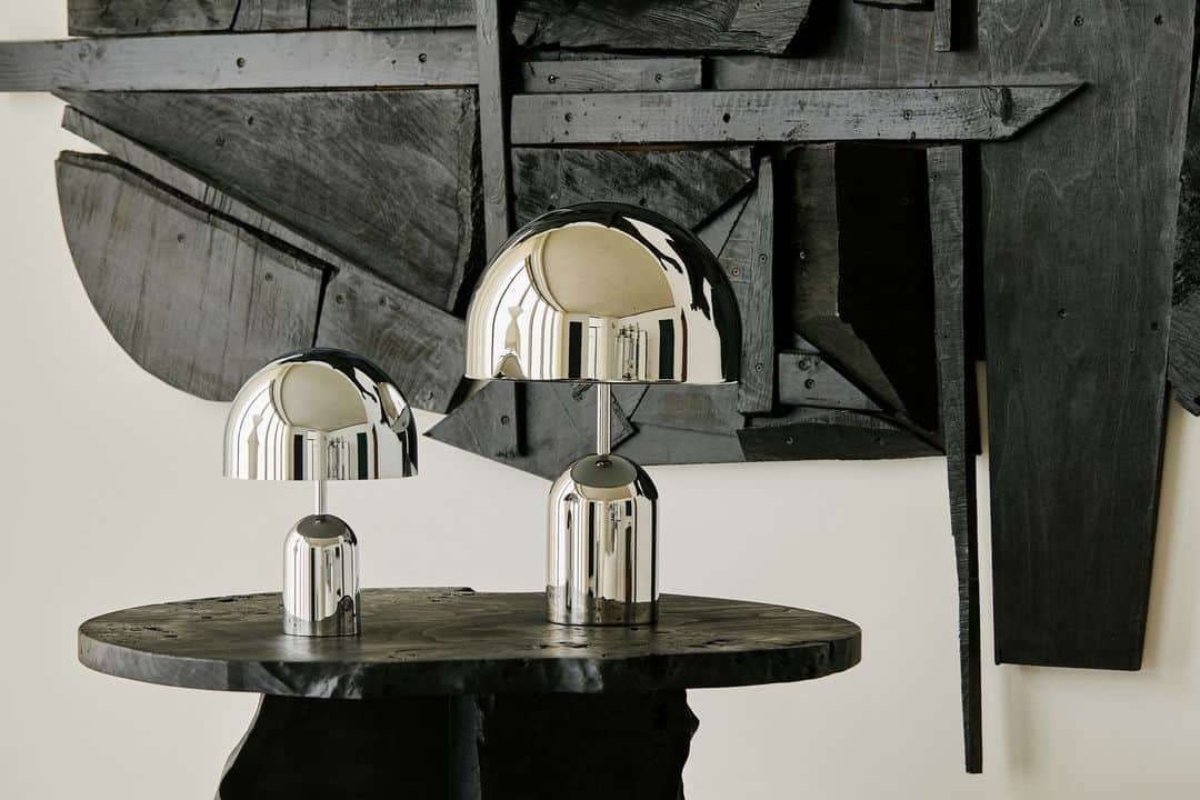 トム ディクソンのインスタグラム：「Inspired by the chromed bumpers of vintage automobiles, BELL’s reflective surface allows it to take on the characteristics of its surroundings. ⁠ ⁠ Available in Portable and Table Light versions.」